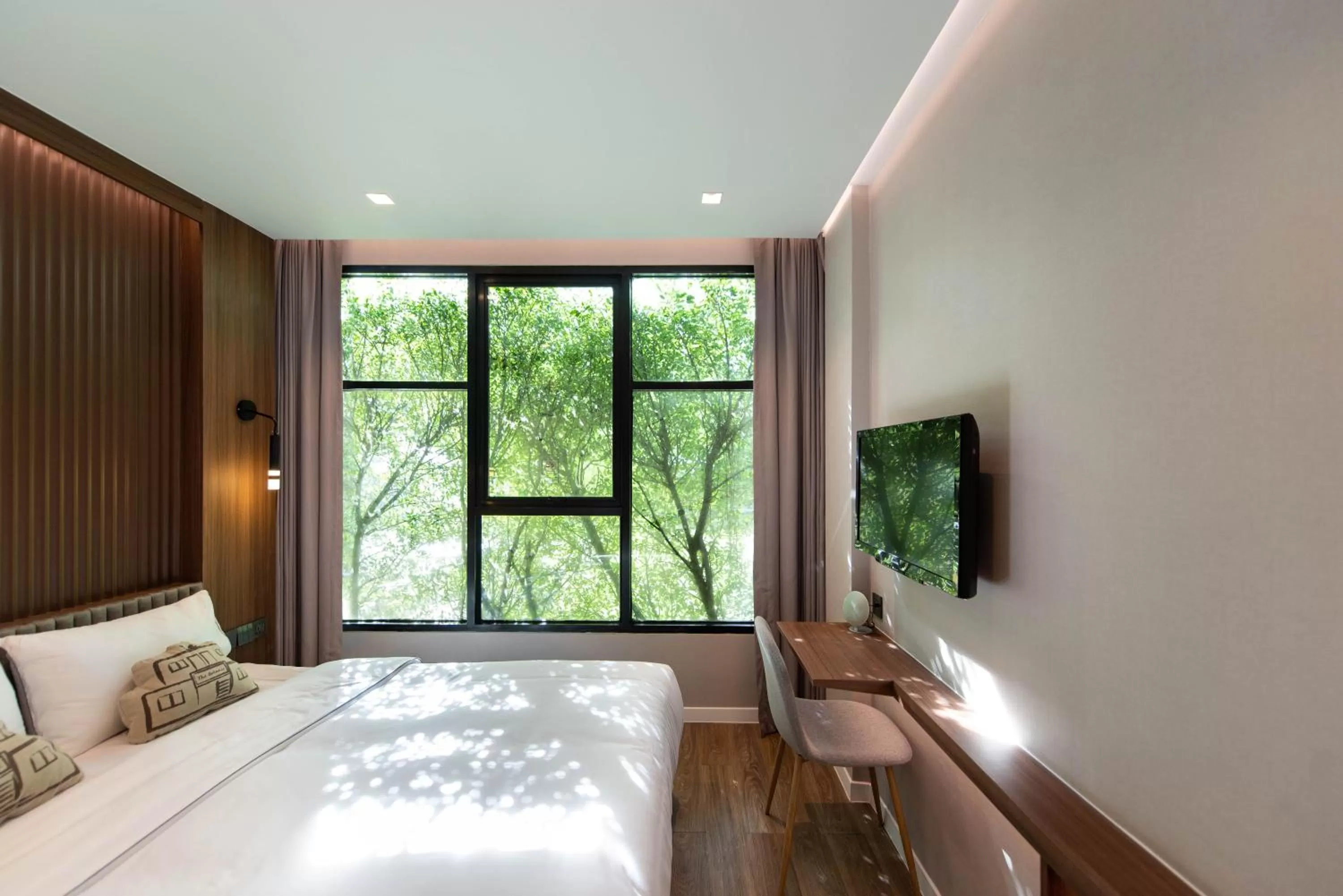 Bed in Botanic Service Room at Impact Muangthongthani - SHA Certified