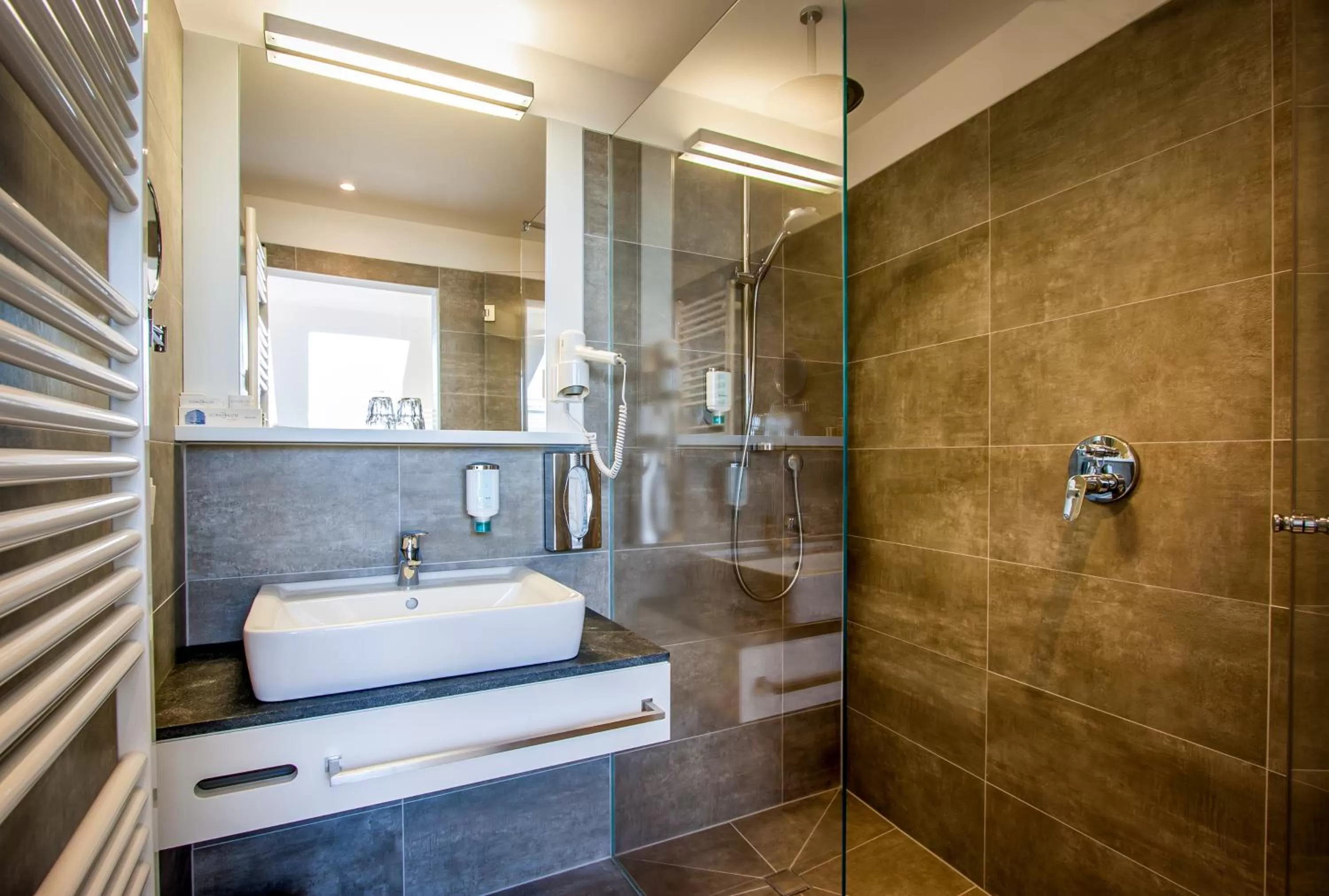 Bathroom in BoutiqueHOTEL Donauwalzer