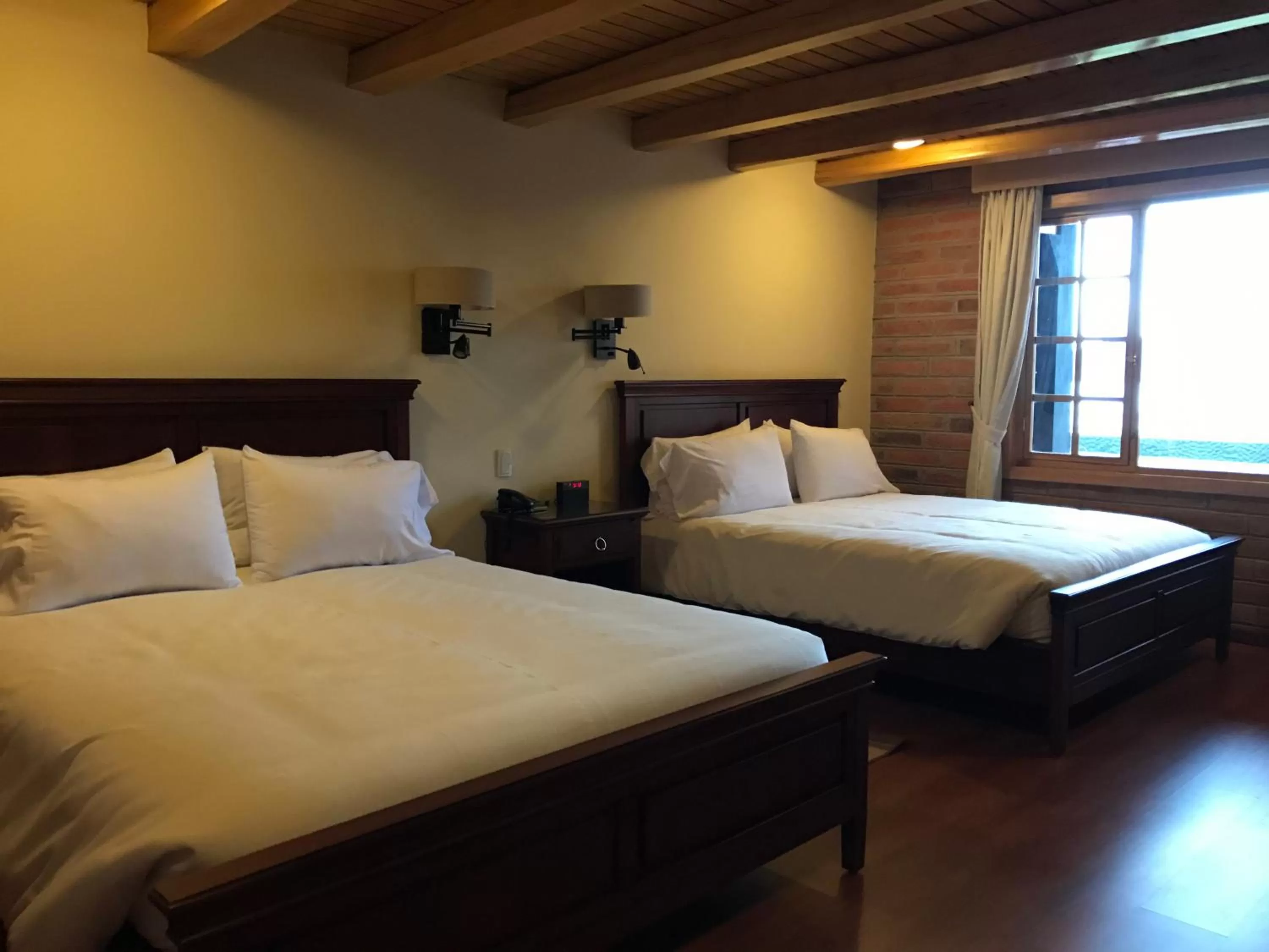 Bed in Puertolago Country Inn & Resort