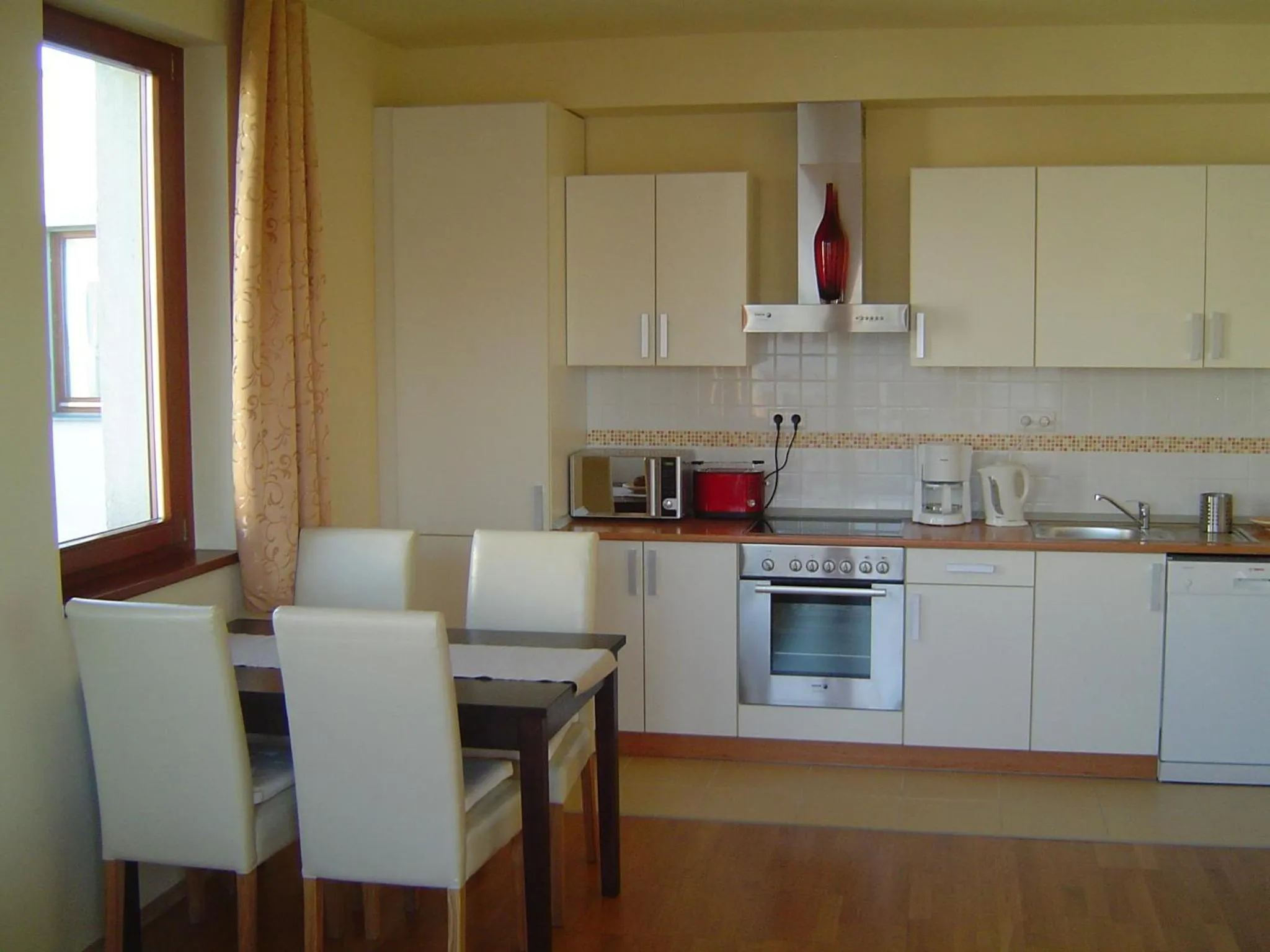 Kitchen or kitchenette in Trendy Deluxe Apartments