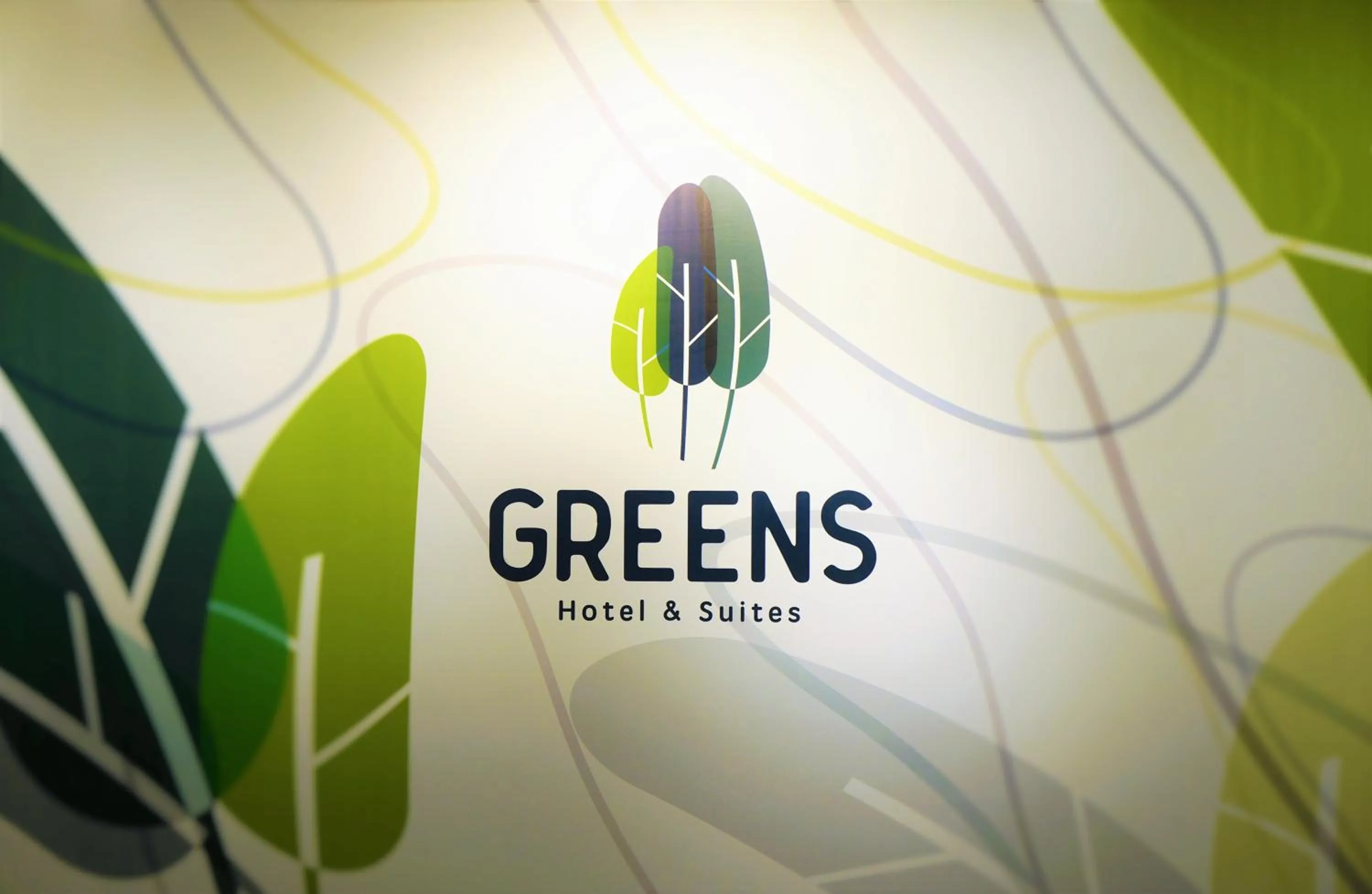 Property logo or sign in Greens Hotel & Suites