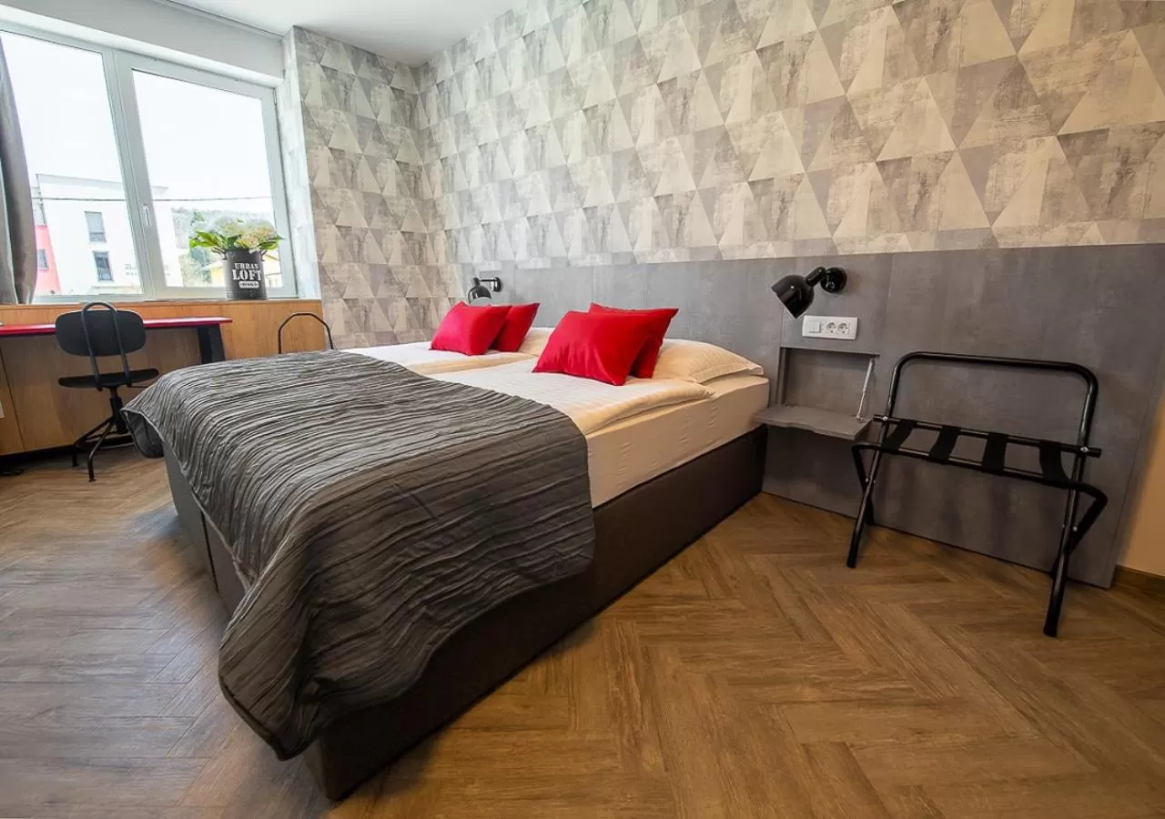 Bed in Urban Ring Hotel