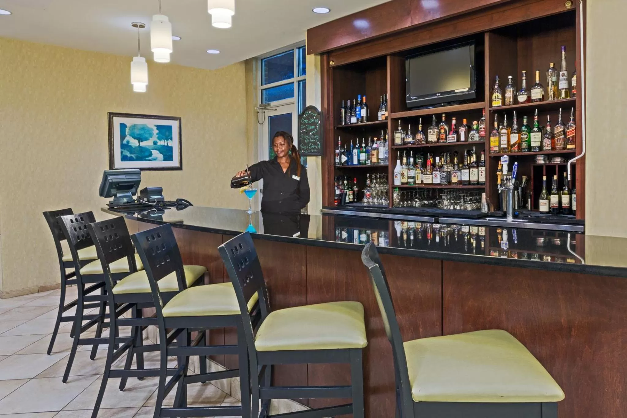 Lounge or bar in Holiday Inn Statesboro-University Area by IHG