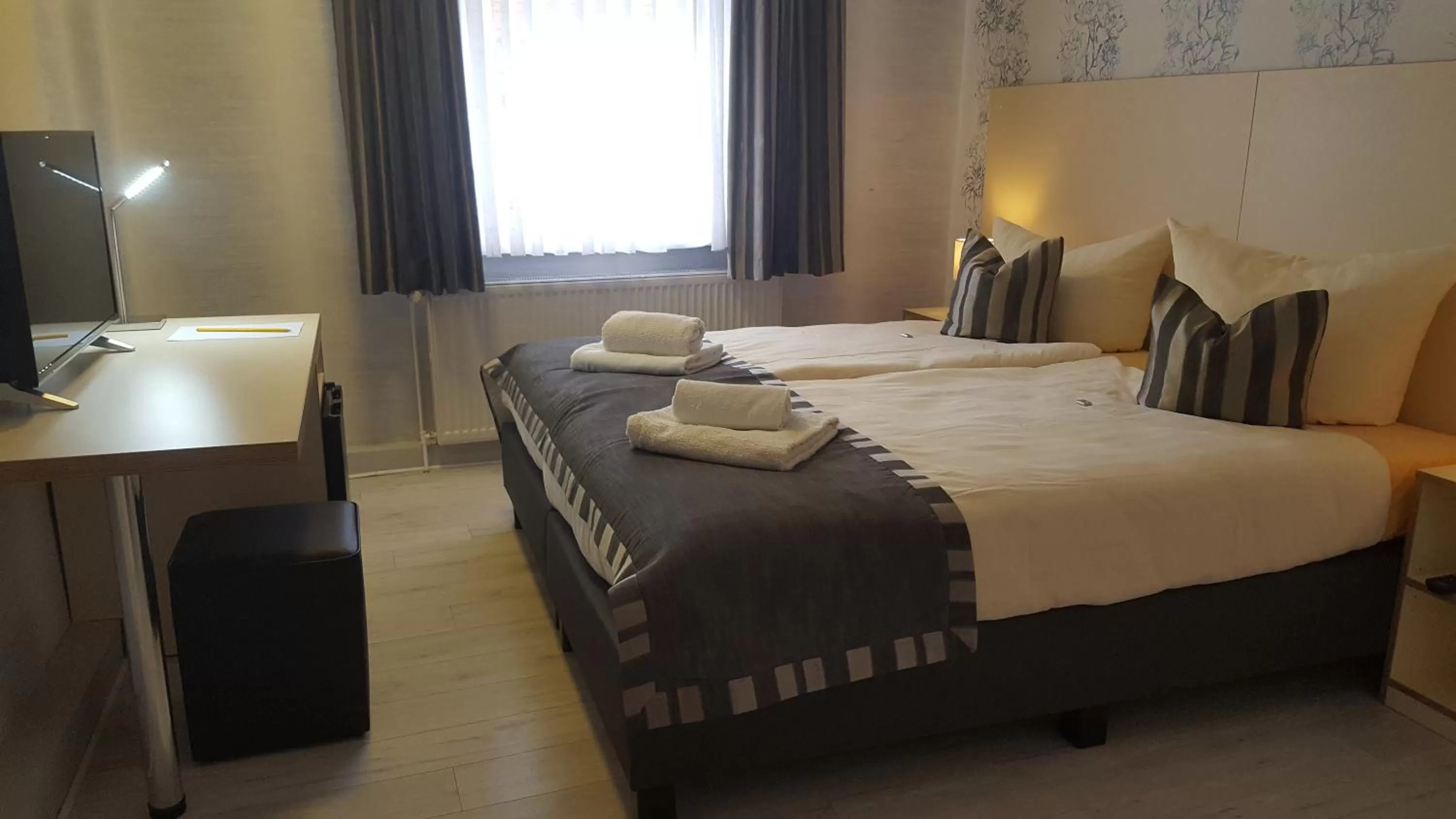 Photo of the whole room, Bed in Novel Hotel