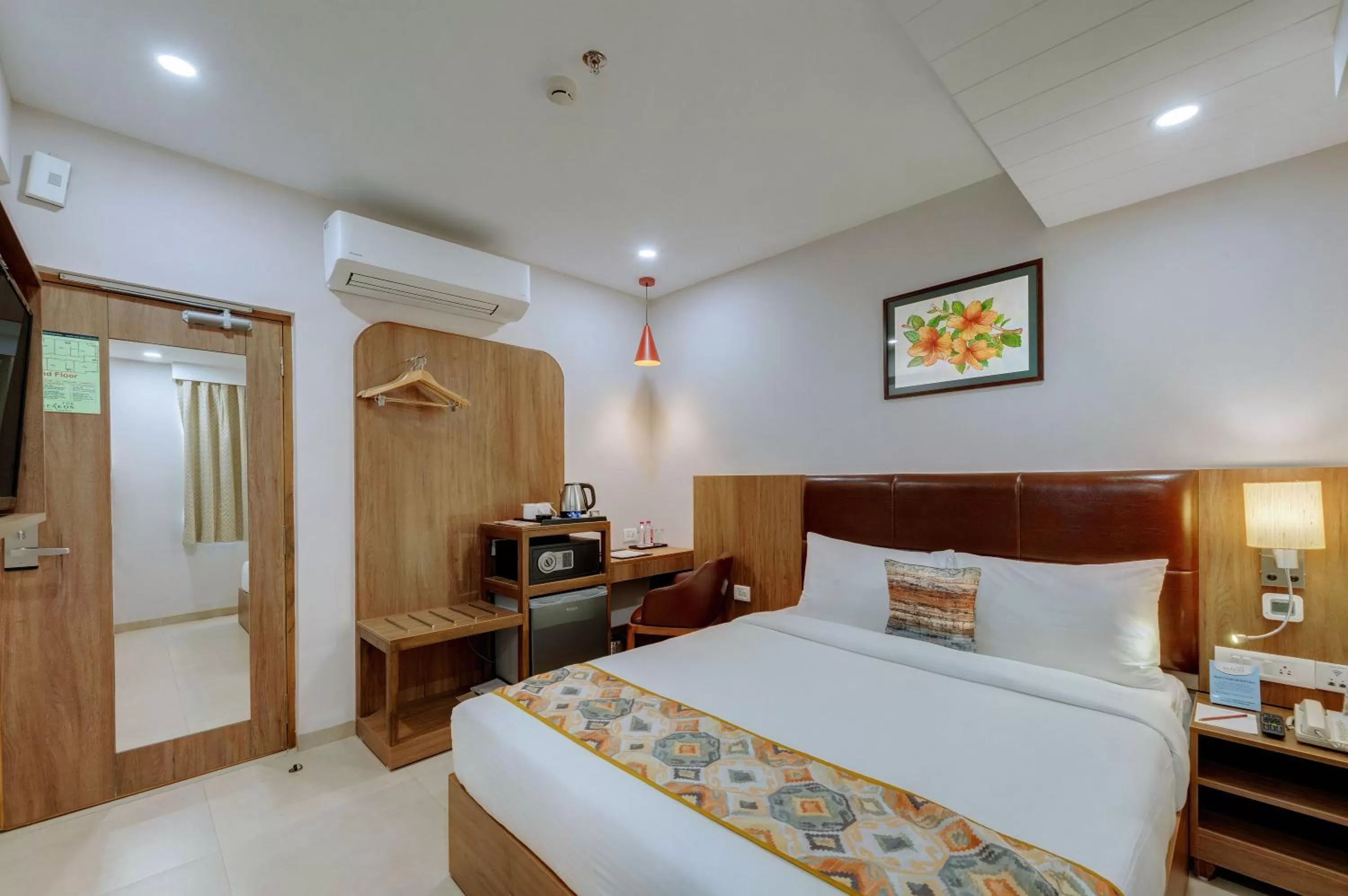 Bed in The Beacon Hotel Vadodara