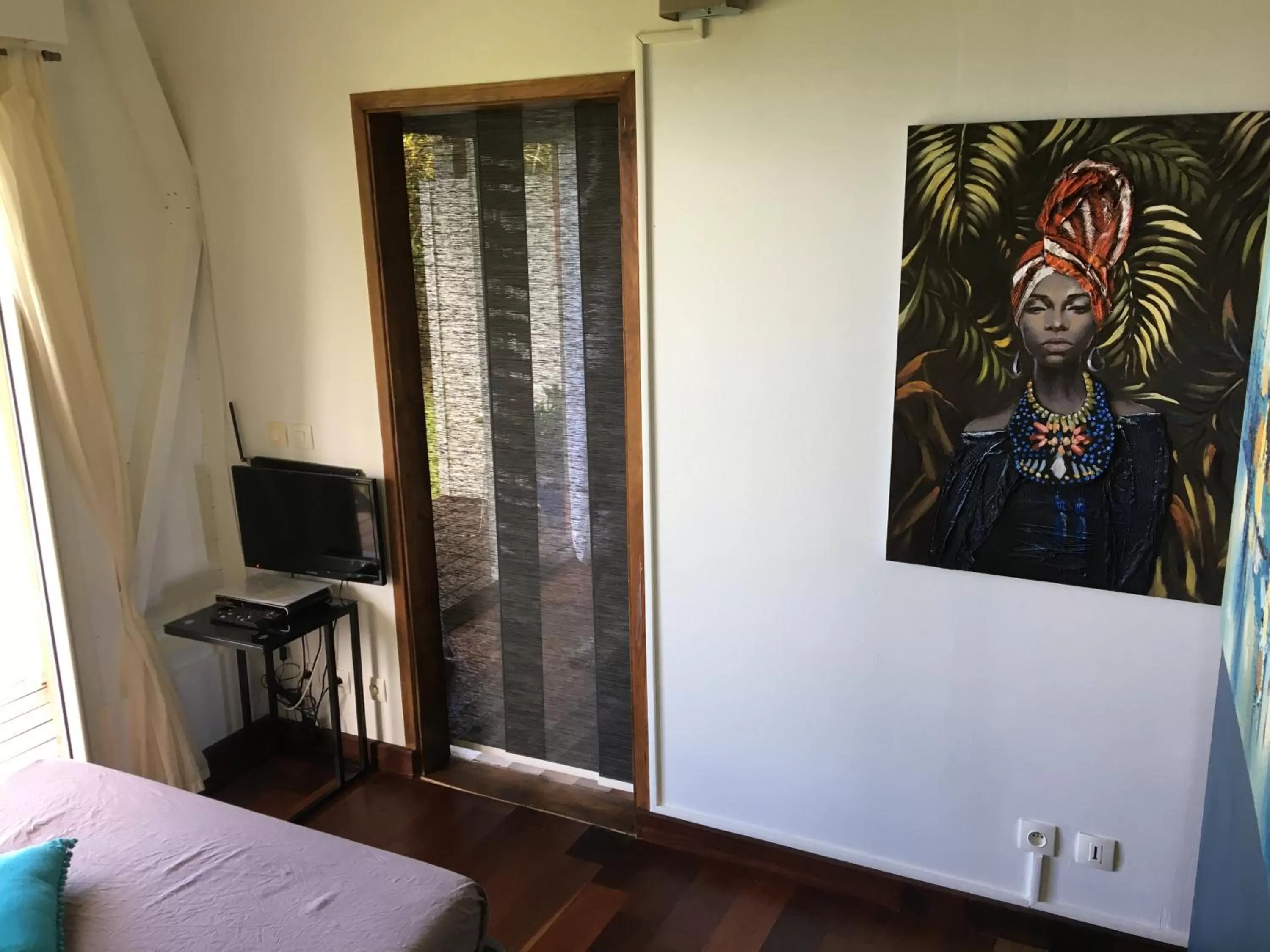 Bed in Villa Cajou chambres d'hôtes chez l'habitant et Zanzibar cottage