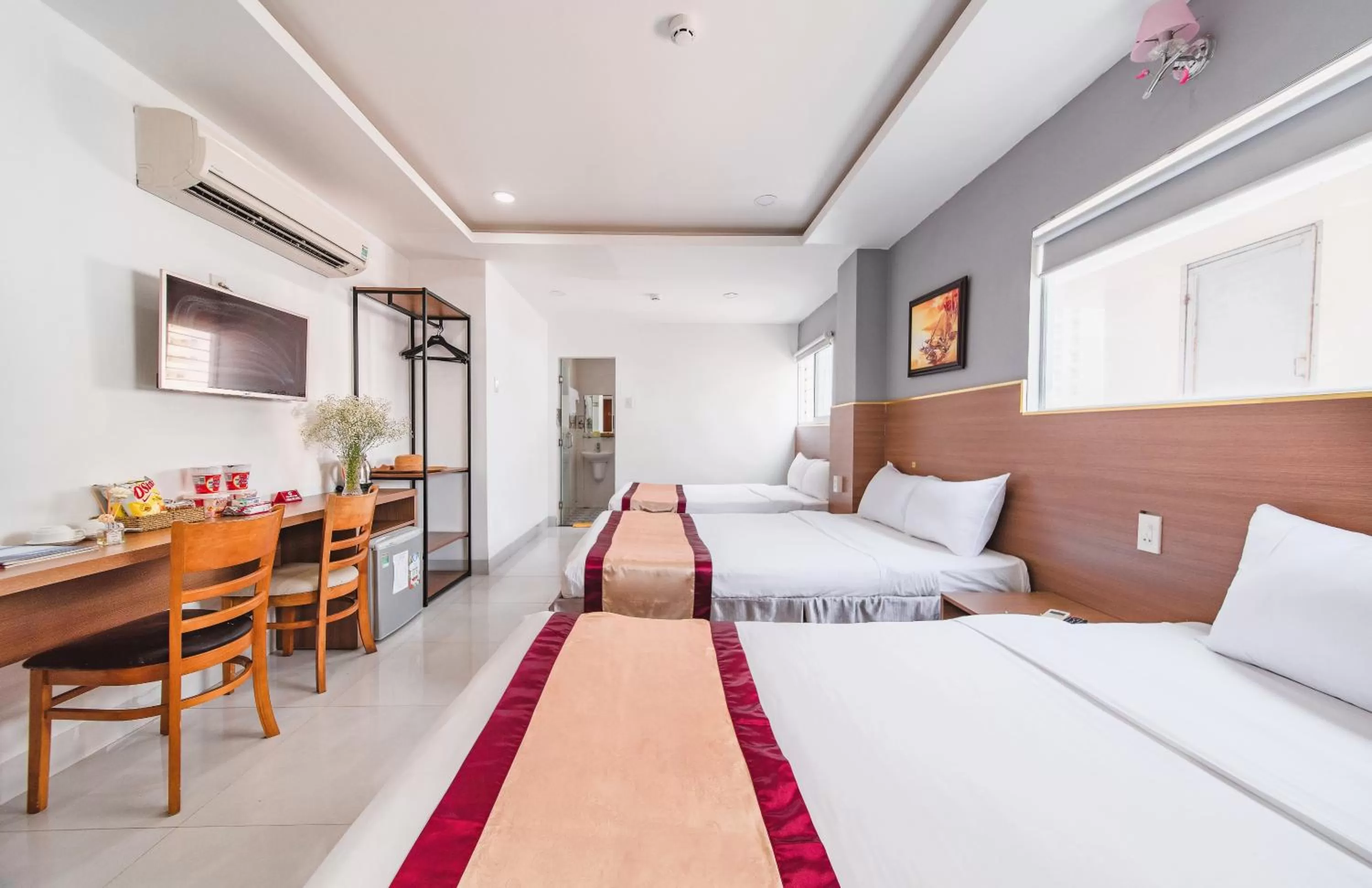 Bed in Arise Seaside Hotel