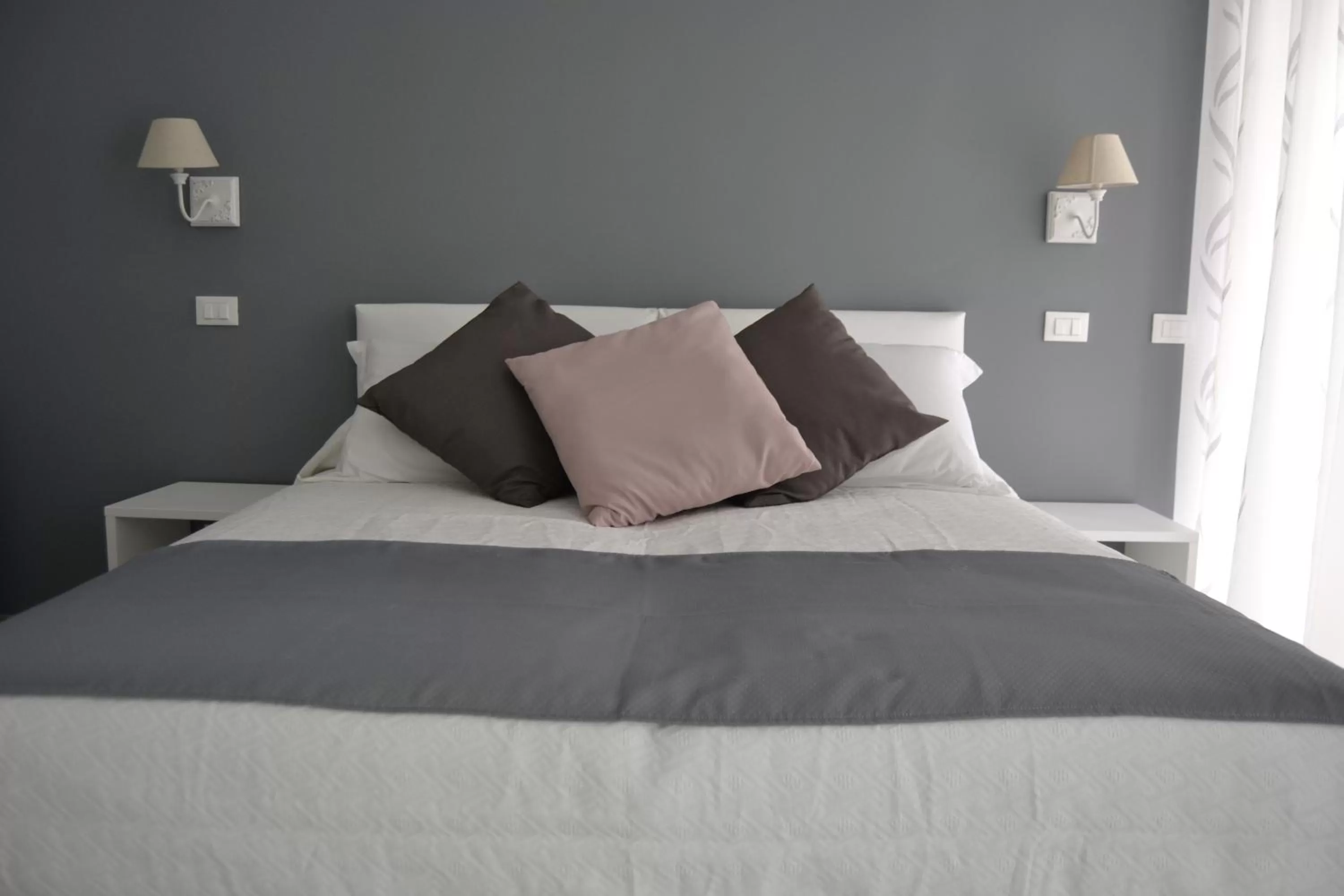 Bed in GLEM rooms & breakfast