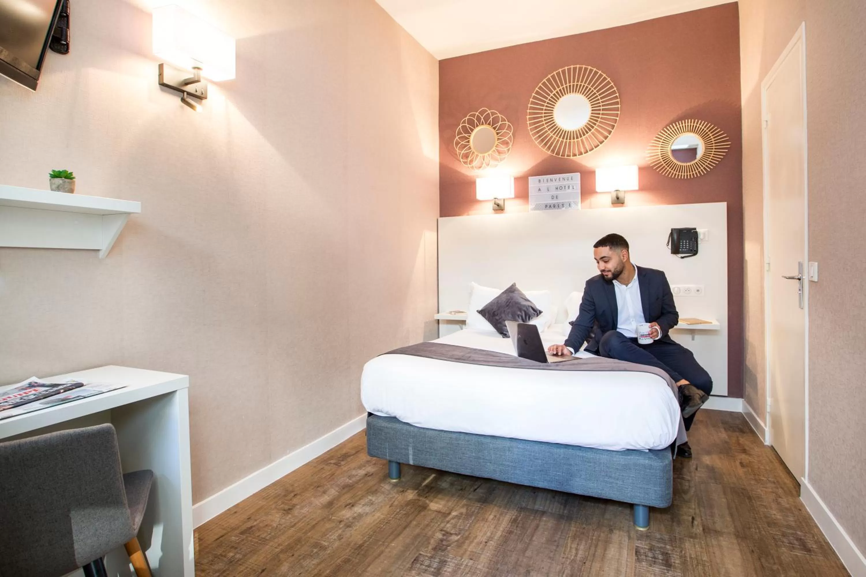 Photo of the whole room, Bed in HOTEL DE PARIS MONTPARNASSE