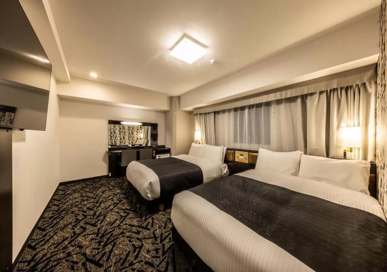 Photo of the whole room, Bed in APA Hotel & Resort Osaka Umeda Eki Tower