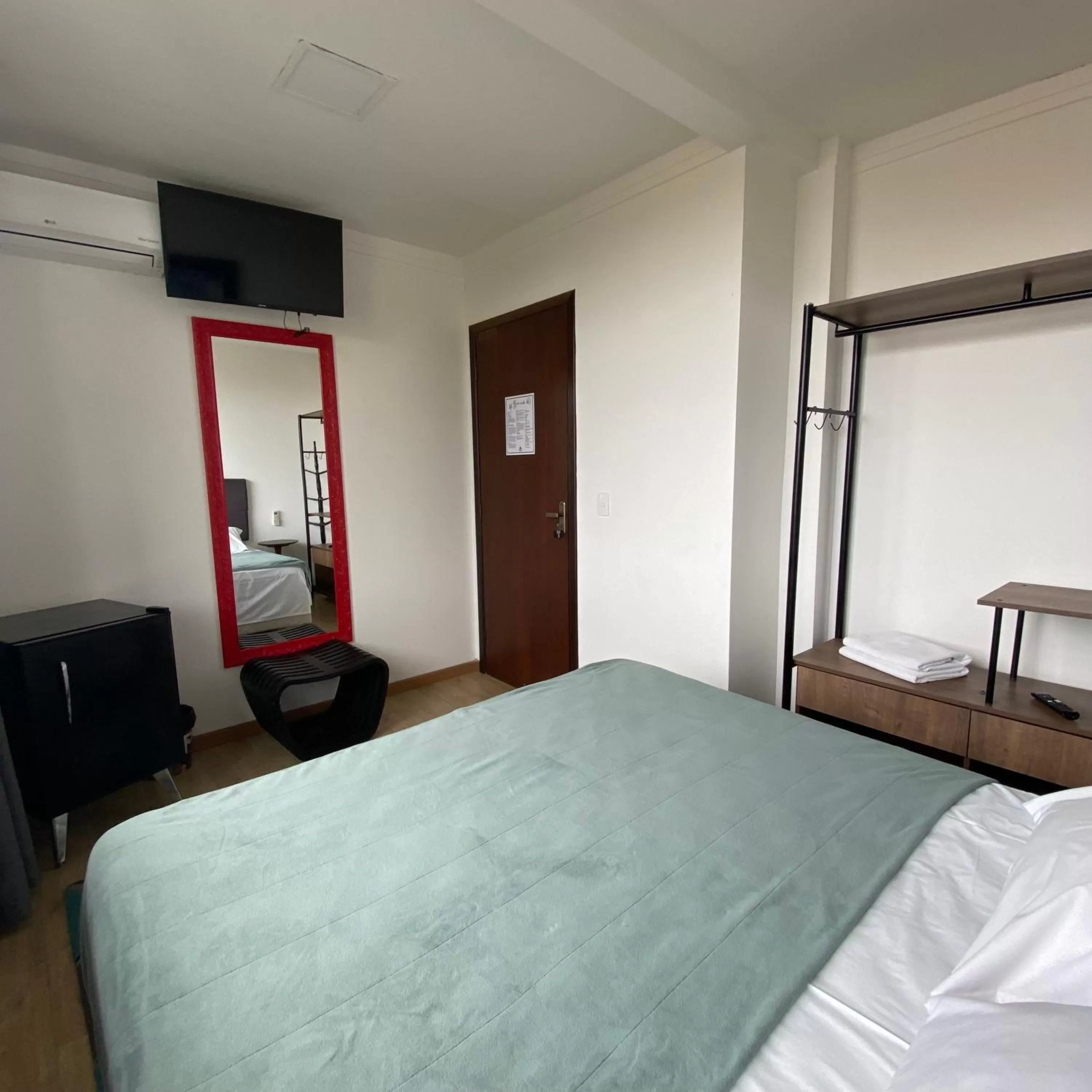 Bed in Pousada Casa da Praia