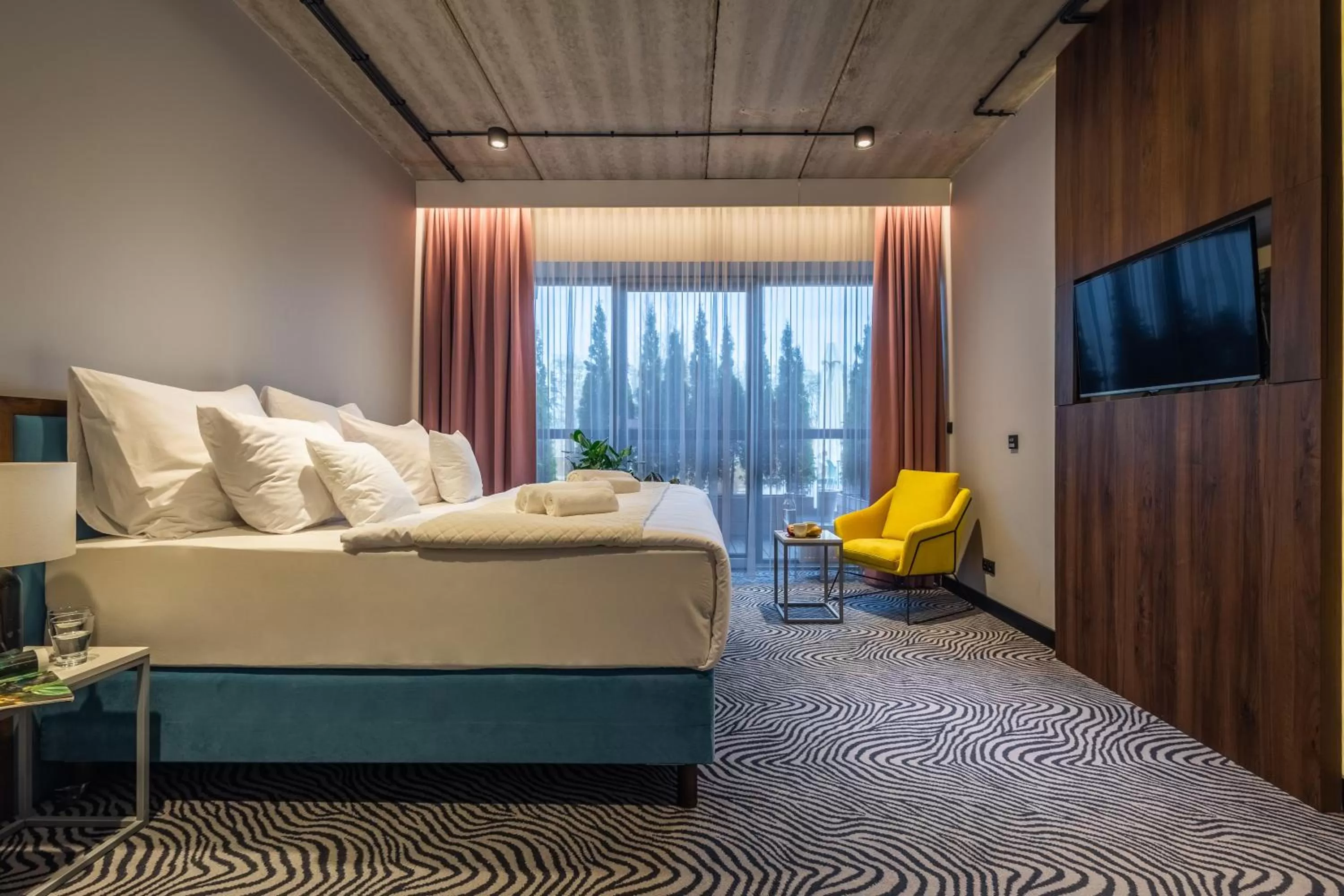 Bed in Hotel Zoo by Afrykarium Wroclaw