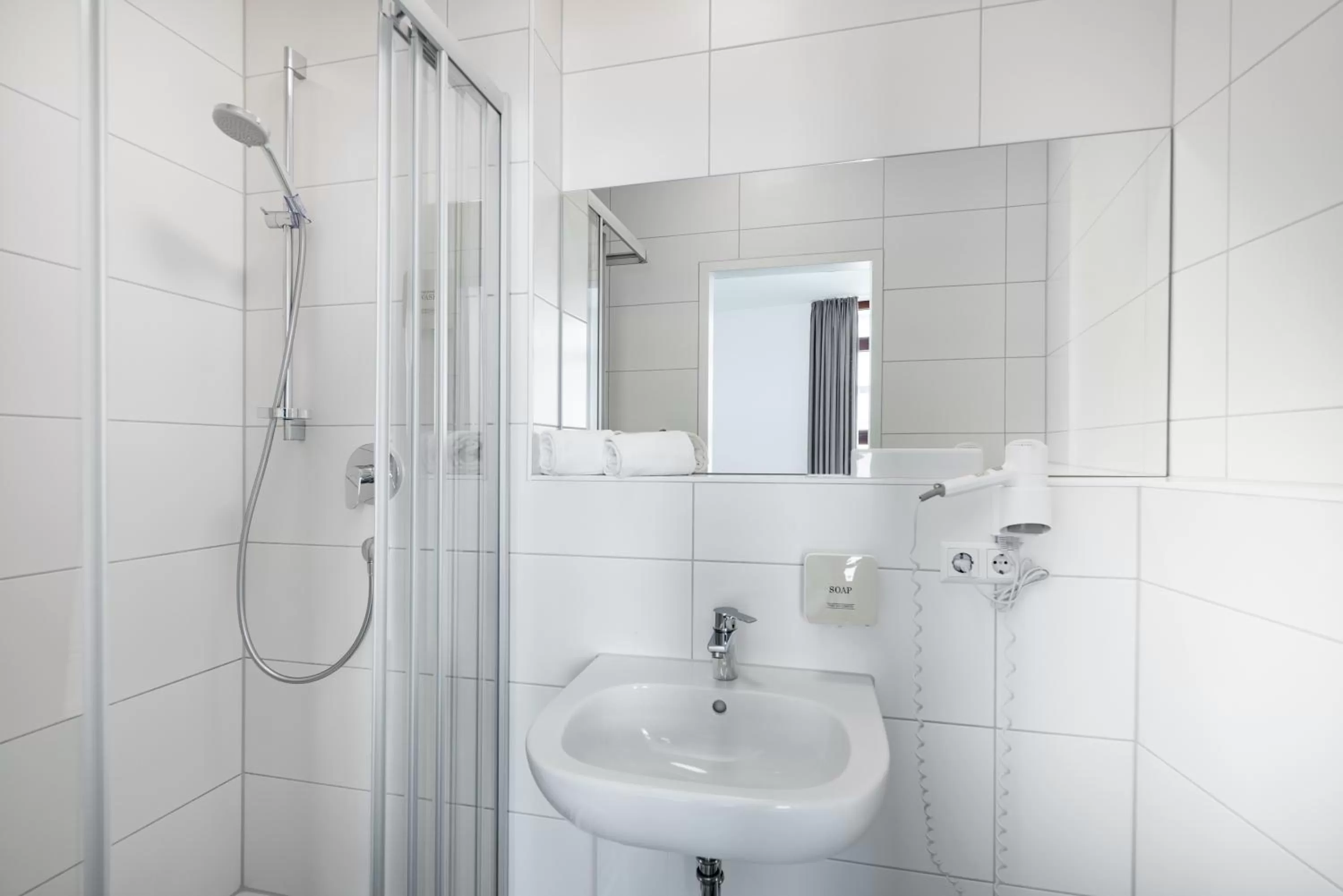 Toilet in Hotel Garni am Olgaeck