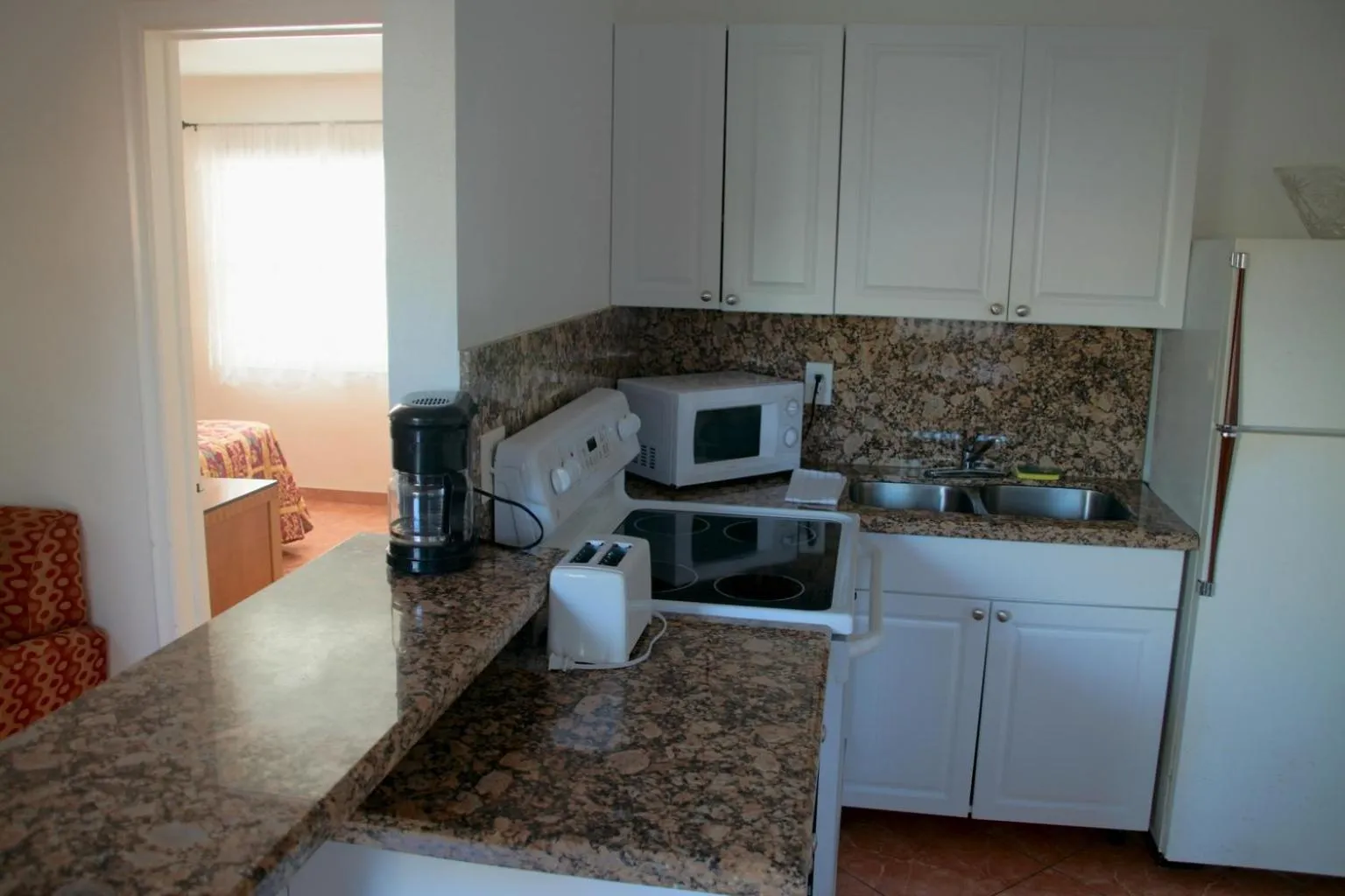 Kitchen or kitchenette in Lago Mar Motel and Apartments