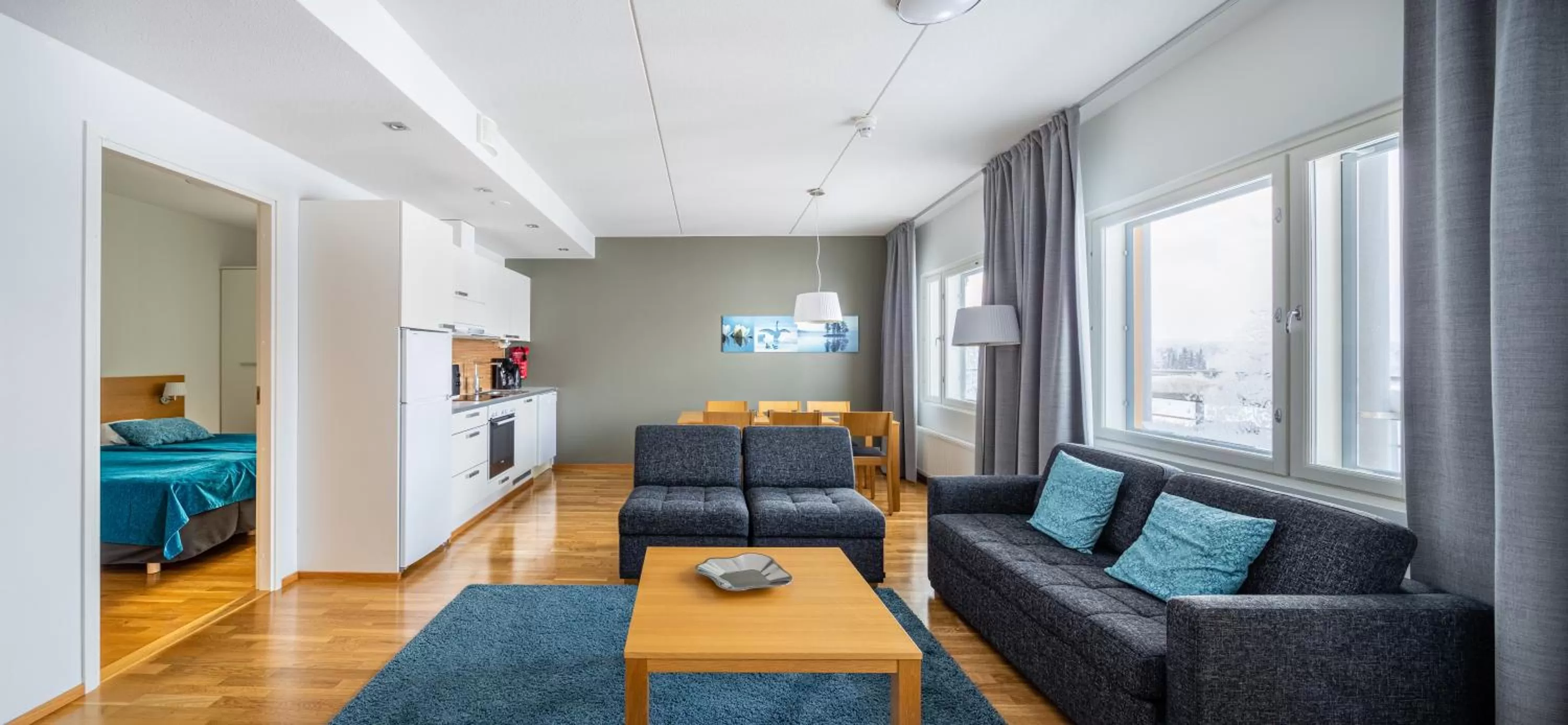 Kitchen or kitchenette, Bed in Ukkohalla Chalets