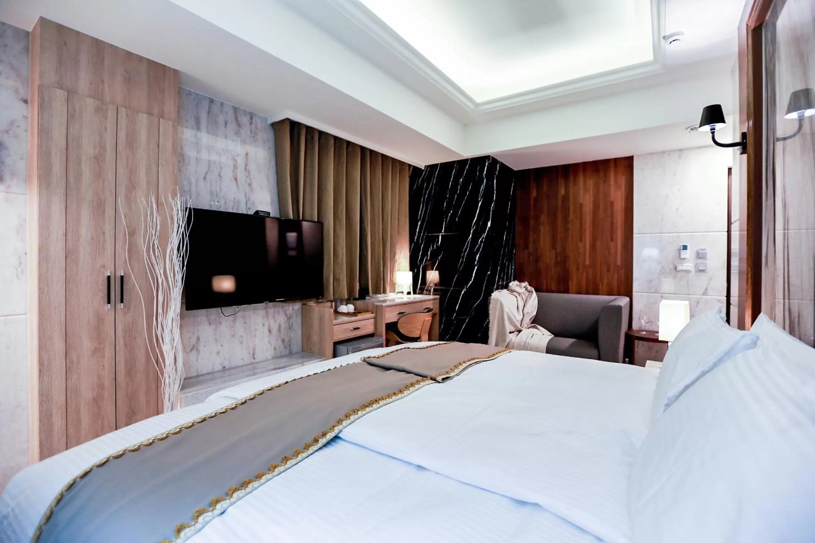 Bed in Hotel Maple Taiwan Boulevard