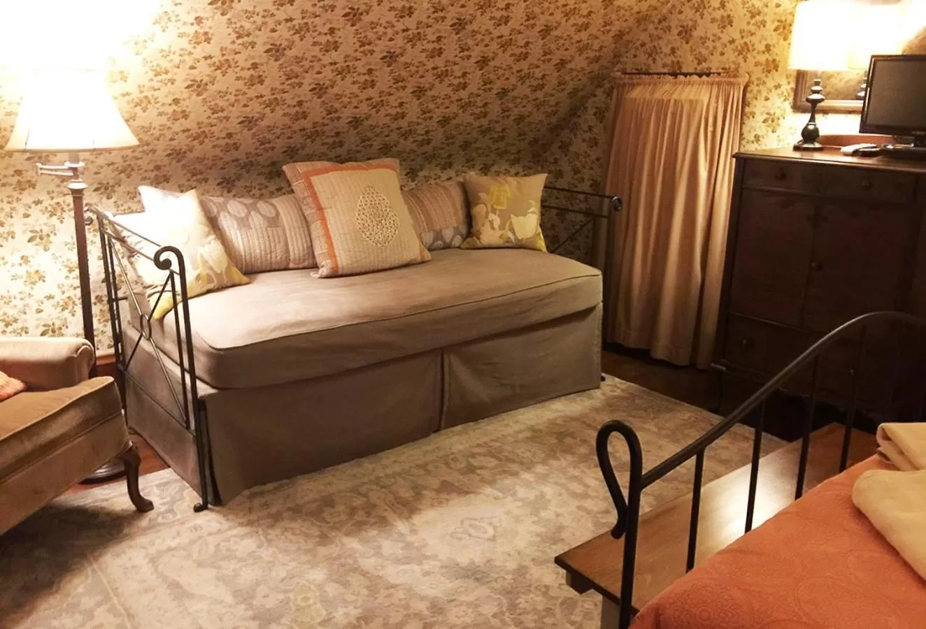 Bed, Seating Area in The Lancaster Bed and Breakfast