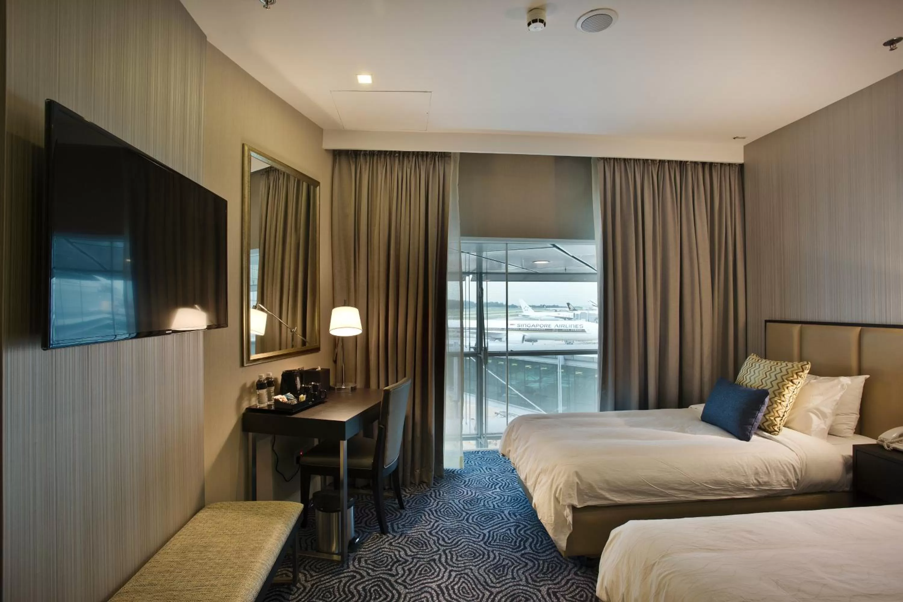 Photo of the whole room, Bed in Ambassador Transit Hotel - Terminal 3