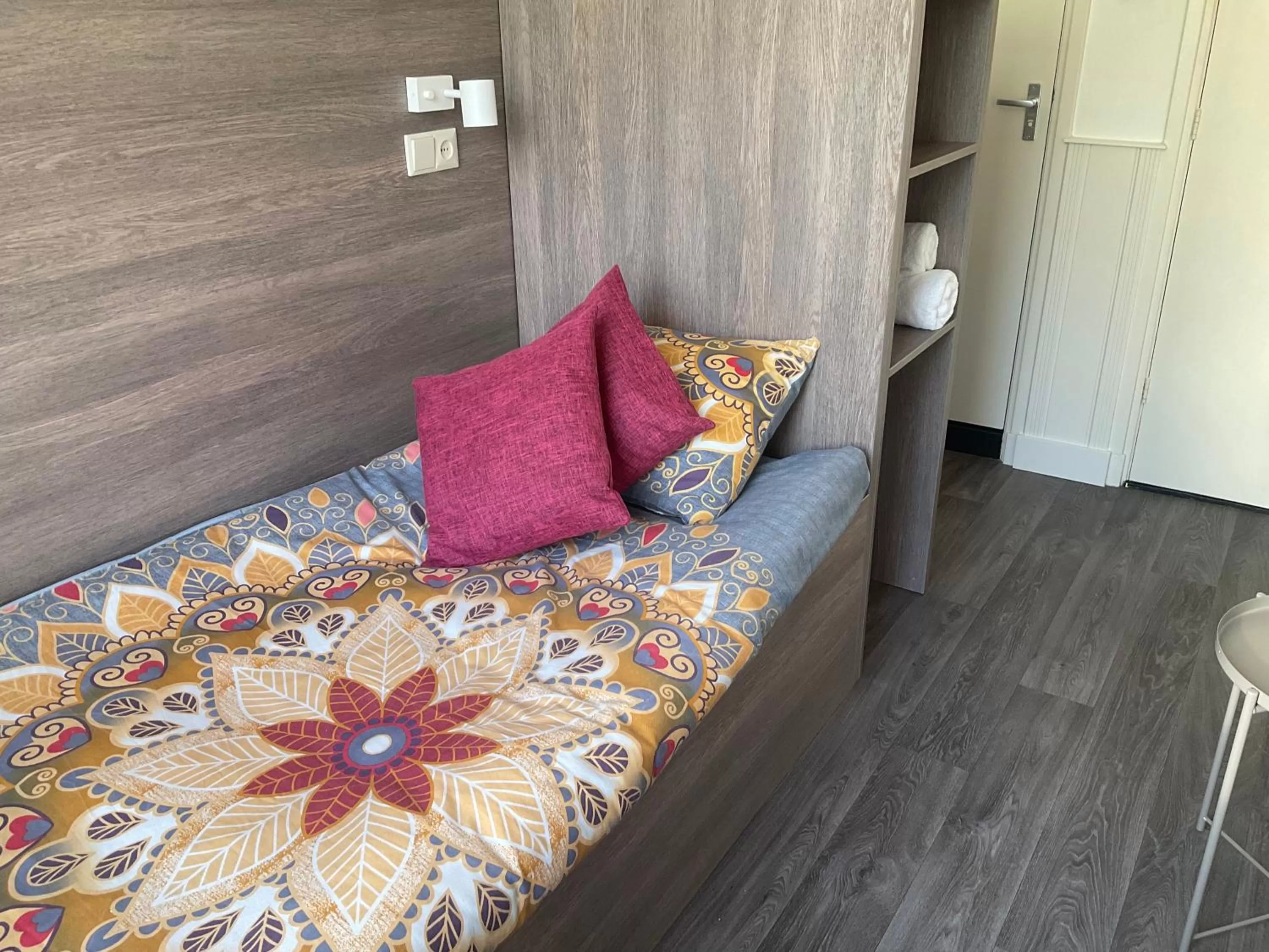 Bed in Hotel Poseidon