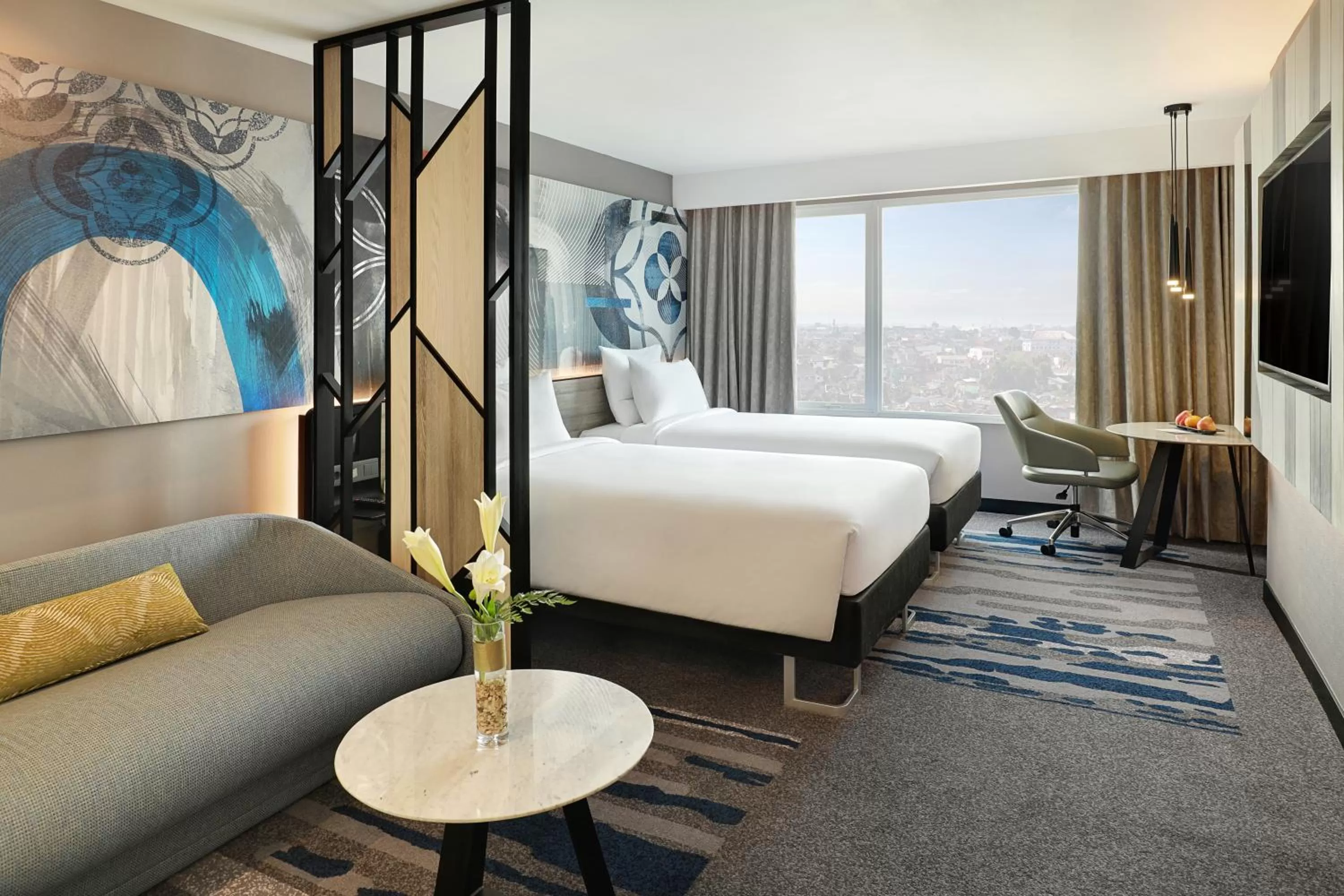 Bed in Novotel Suites Yogyakarta Malioboro