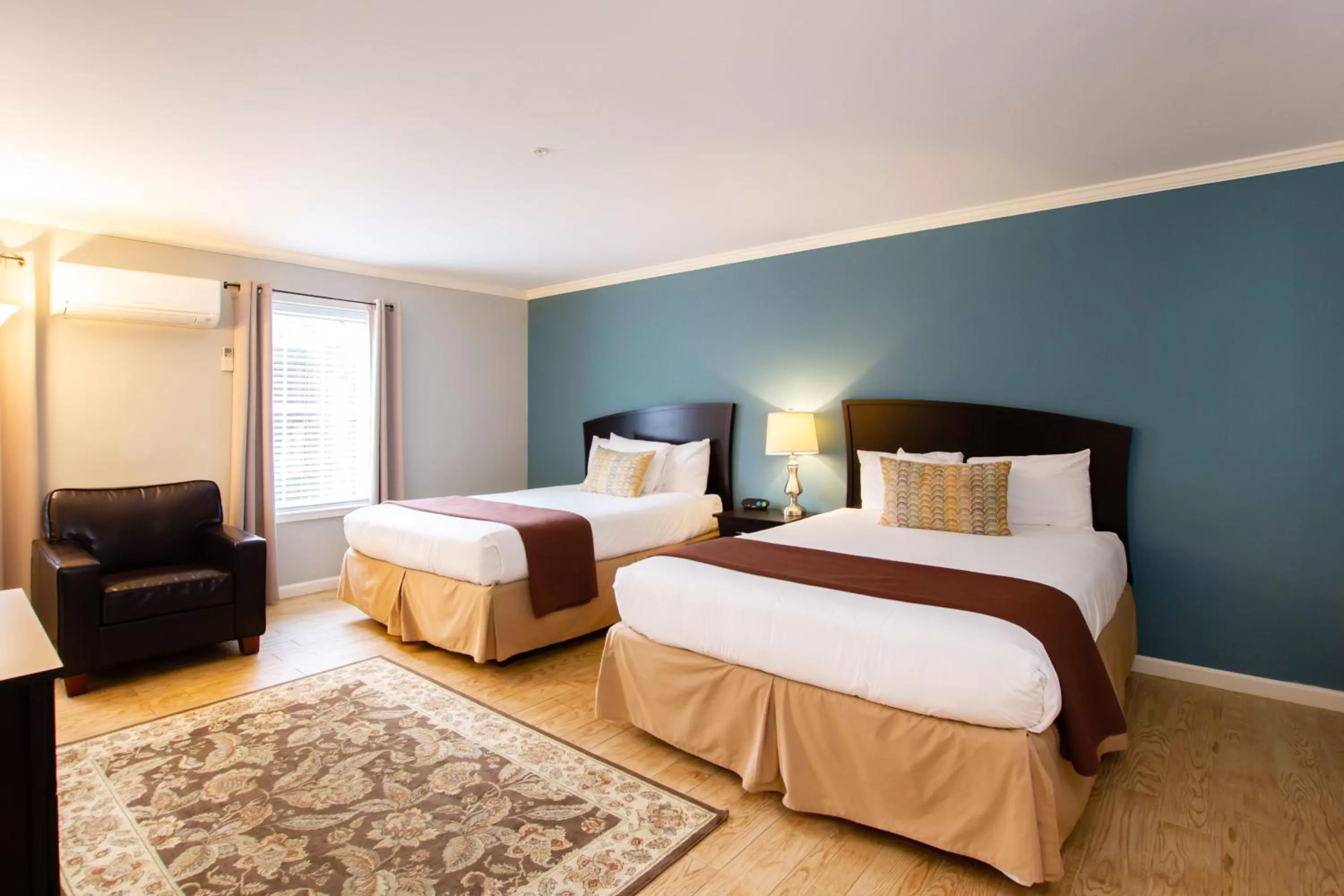 Bed in The Dahlonega Square Hotel