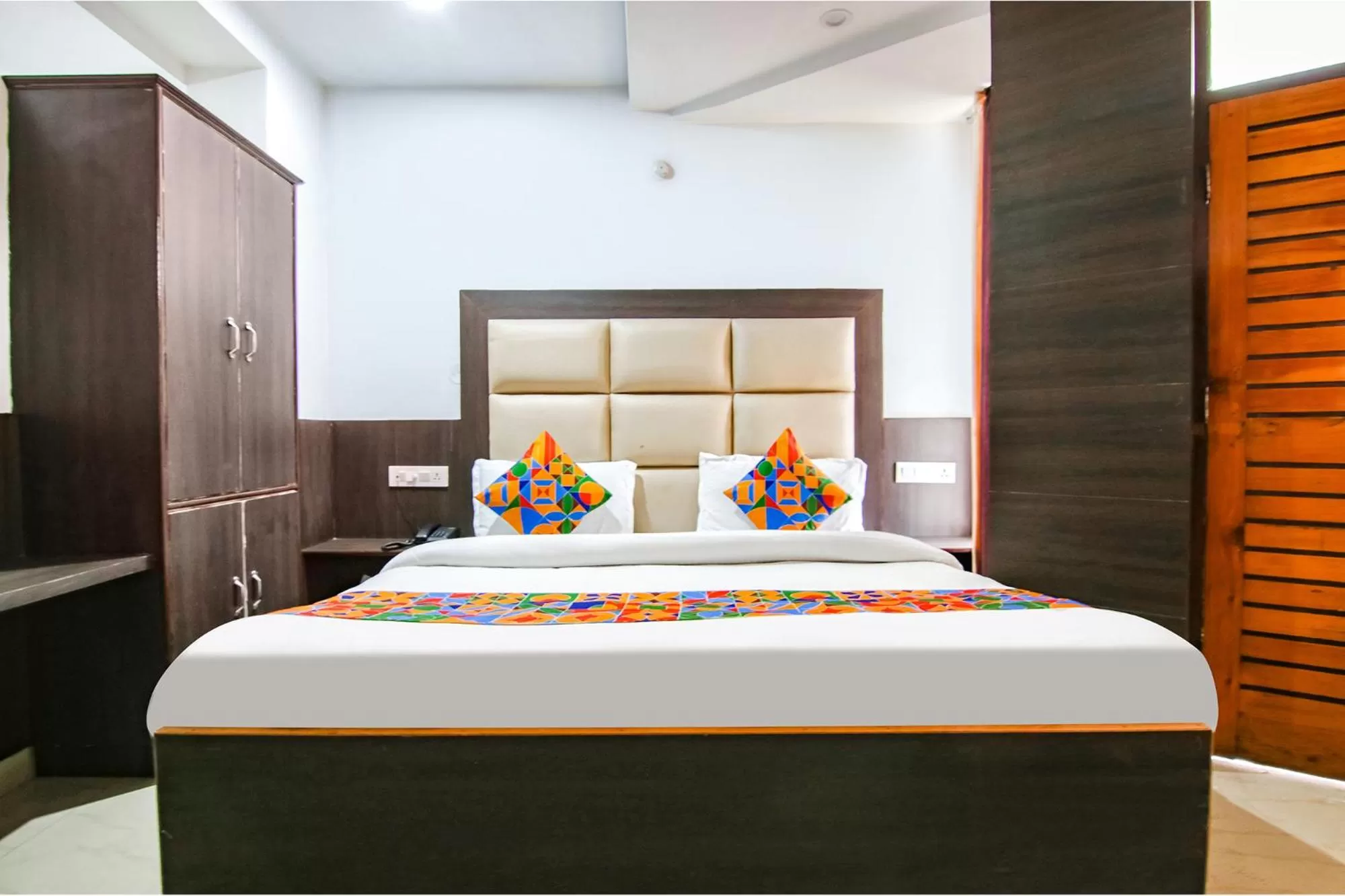 Bed in FabHotel Rosewood Inn I