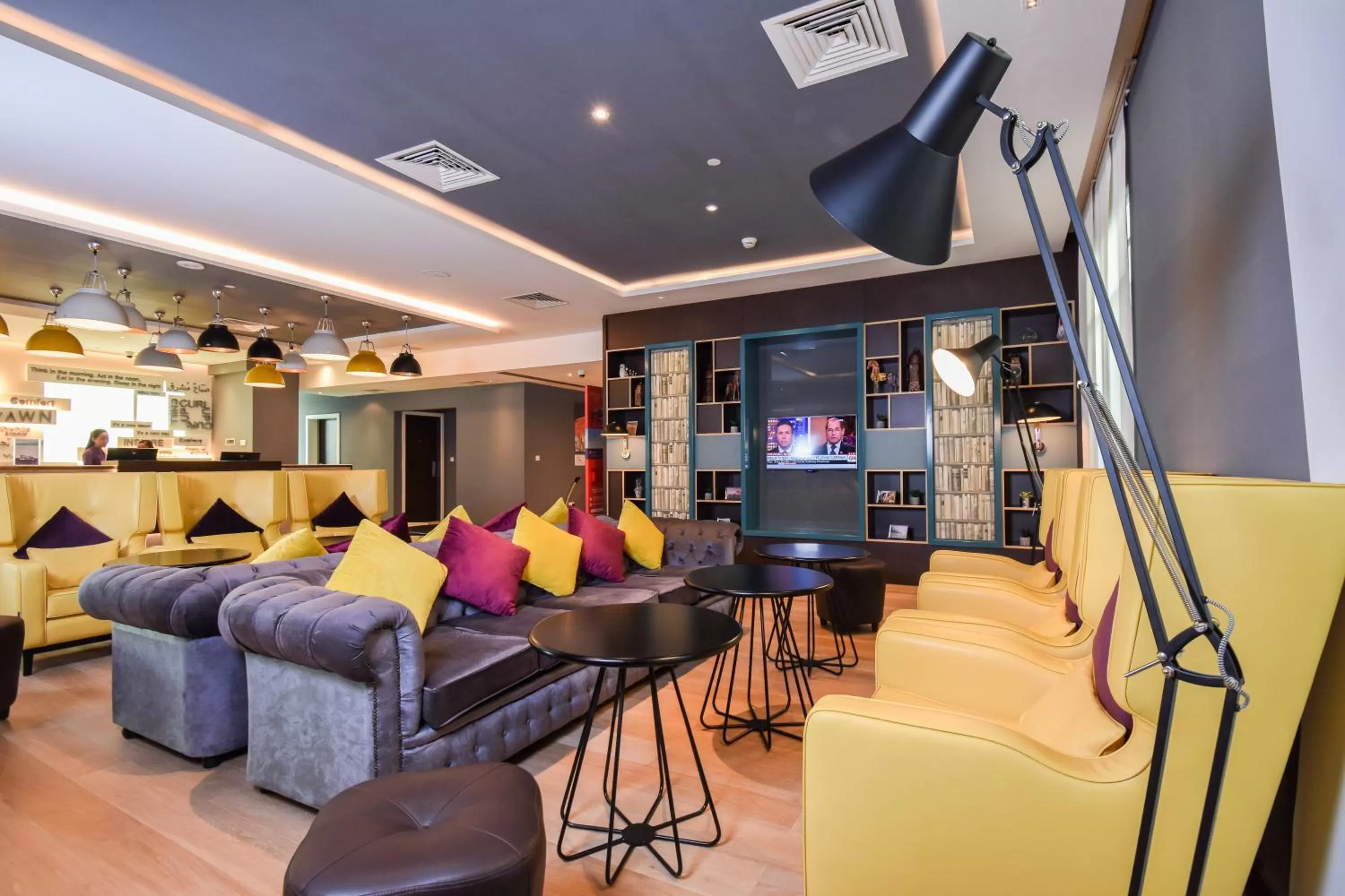 Communal lounge/ TV room in Premier Inn Dubai Investments Park - An Emirates Group Company