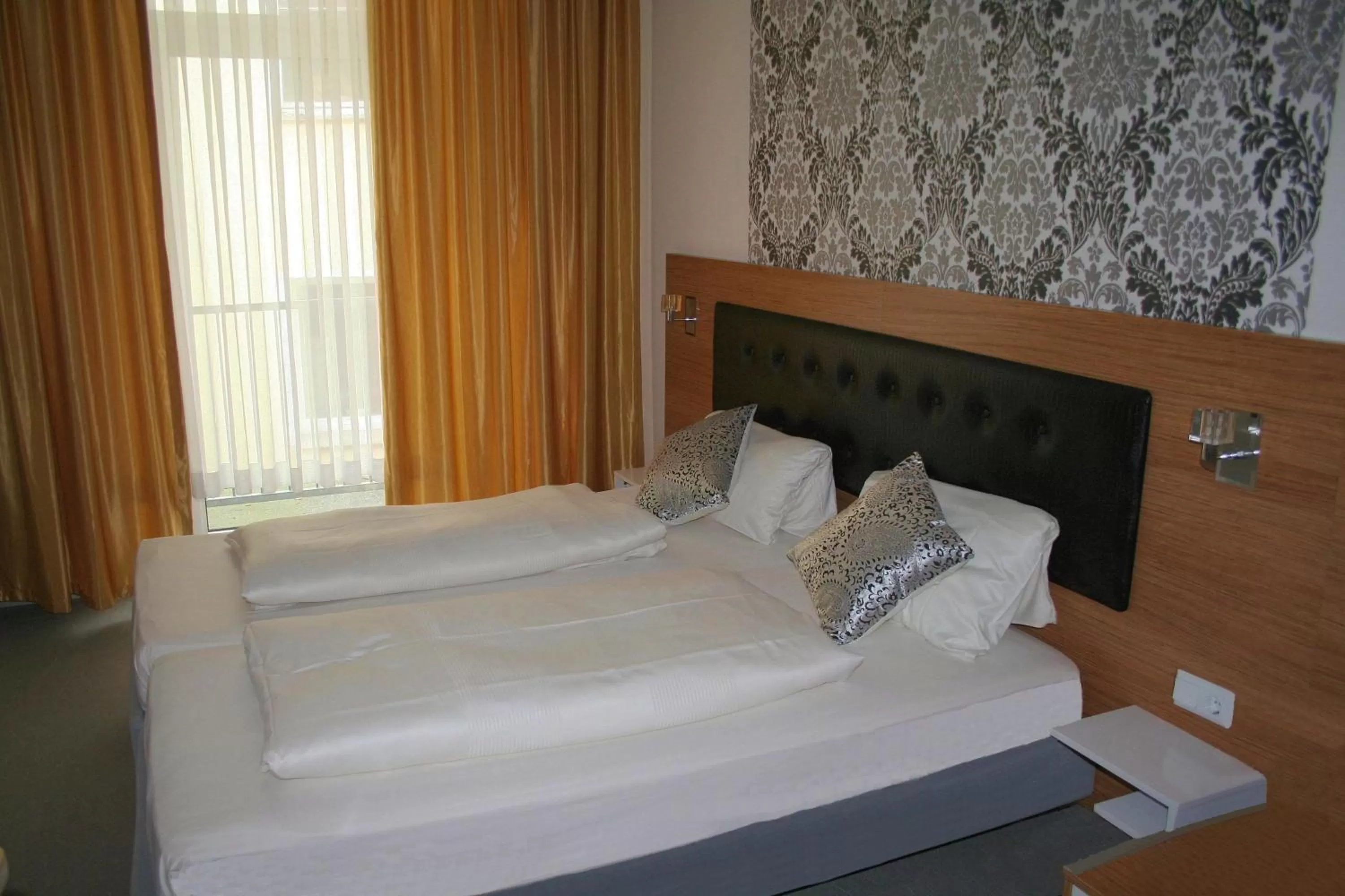 Bed in Hotel Drei Kronen