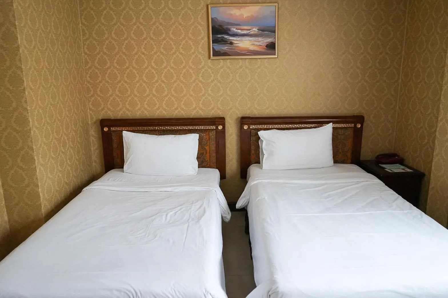 Bed in Grand Lucky Hotel