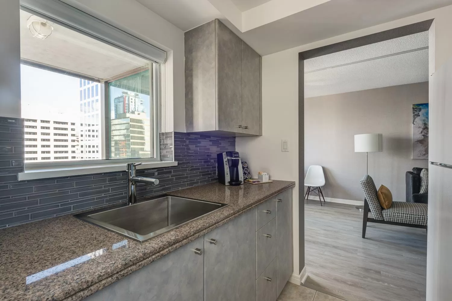 Kitchen or kitchenette in Carmana Hotel & Suites