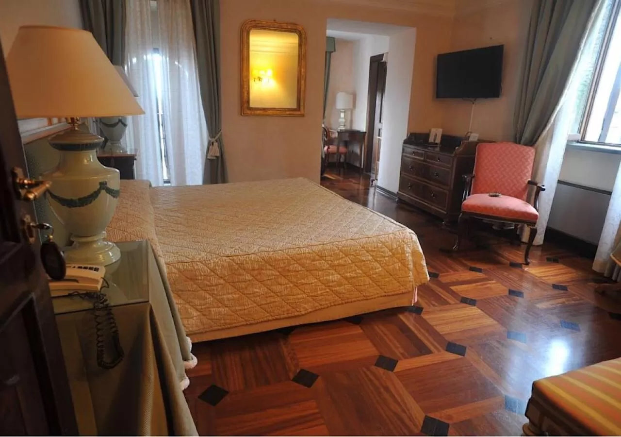 Photo of the whole room, Bed in Relais Ducale