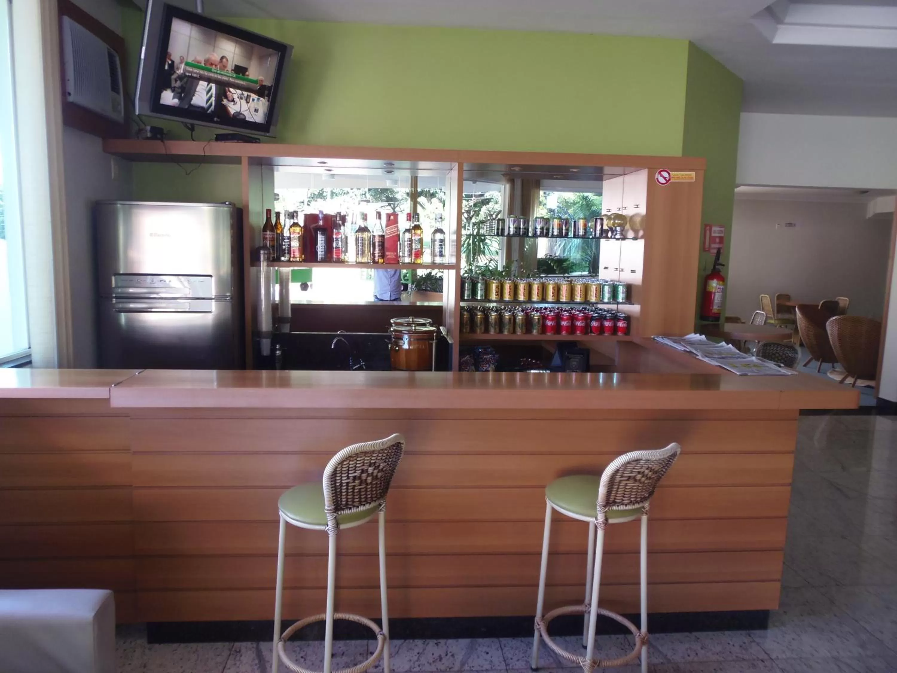 Communal lounge/ TV room in Sanare Hotel