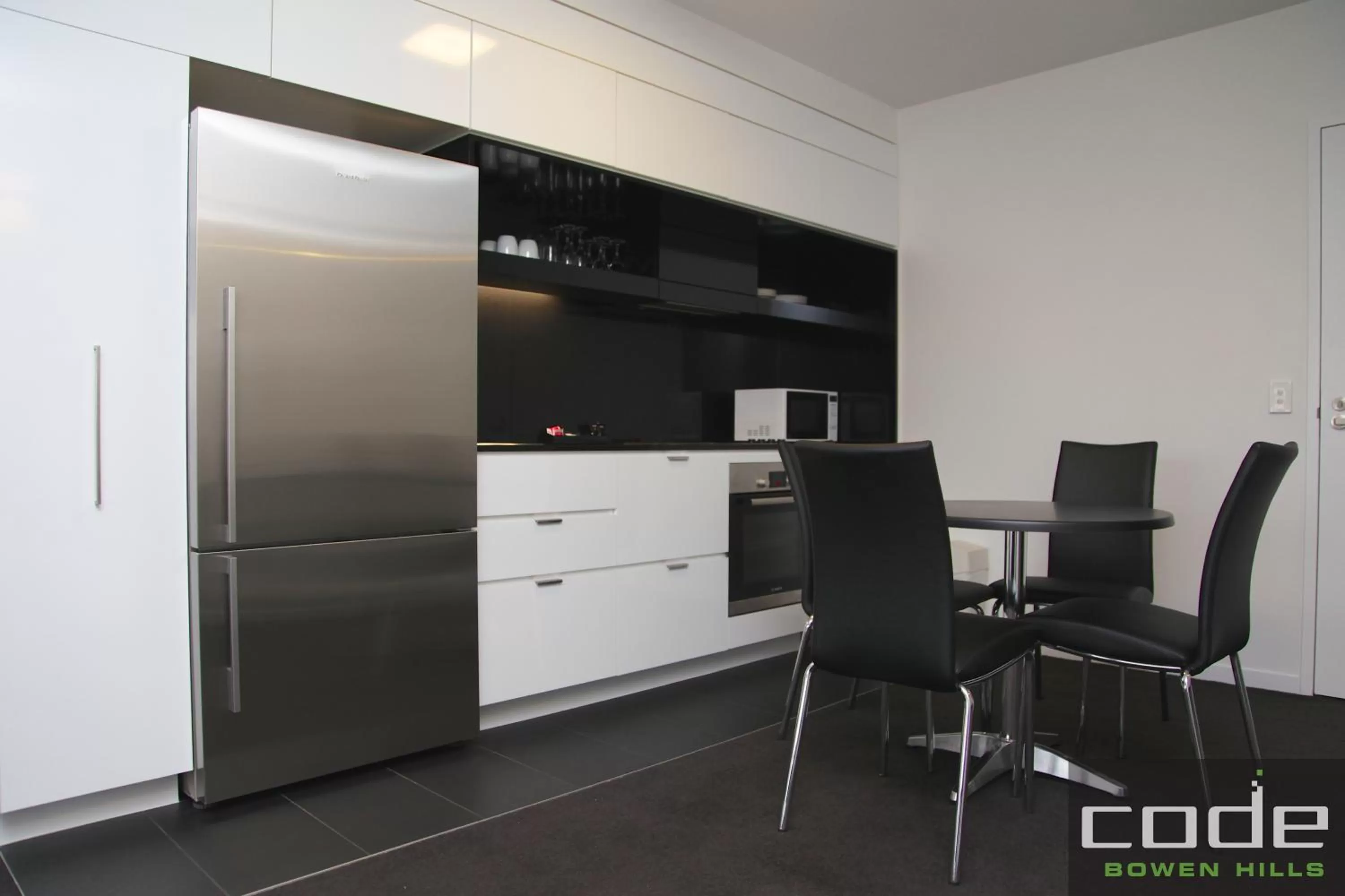 Kitchen or kitchenette in Code Apartments