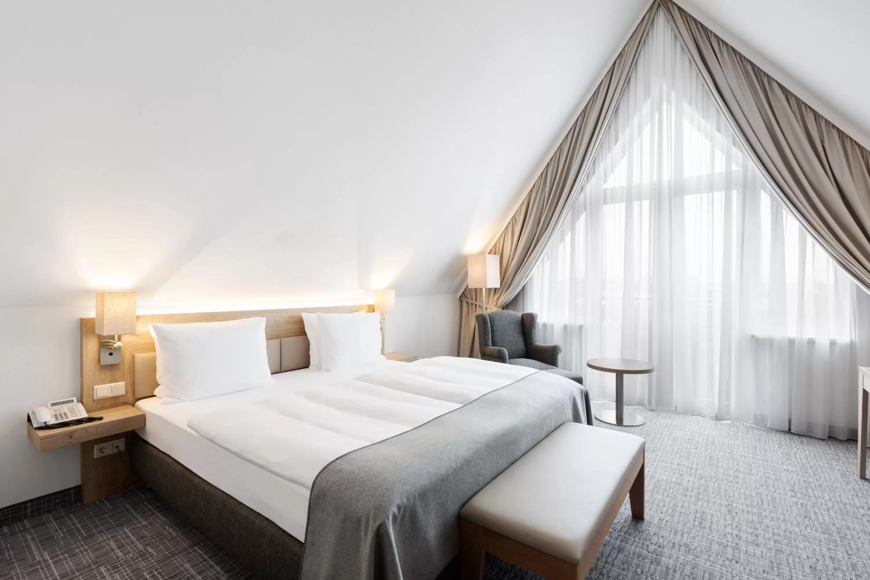 Photo of the whole room, Bed in Holiday Inn Nürnberg City Centre by IHG