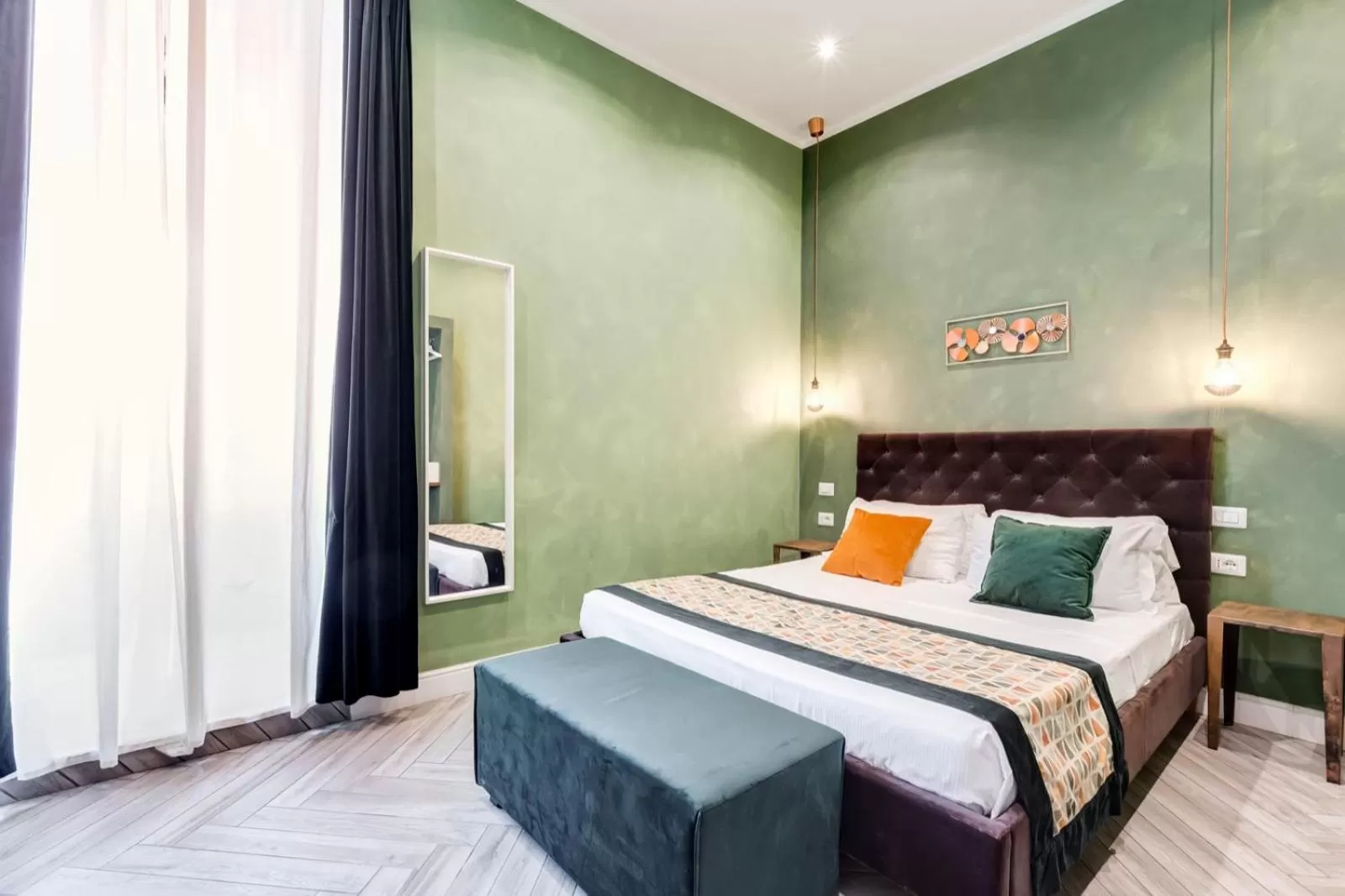 Bed in Ripetta Deluxe Suites