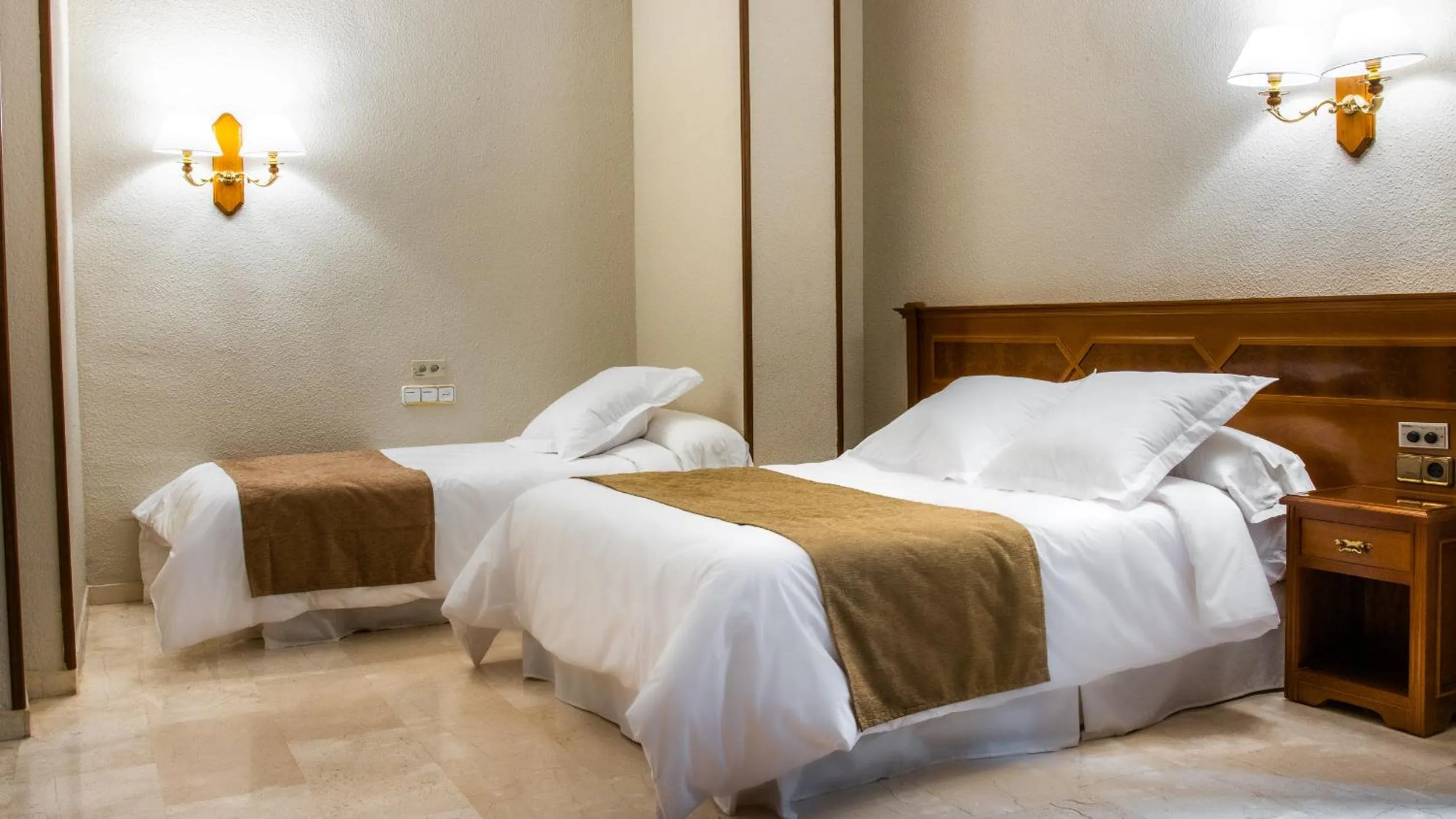 Bed in Hotel Reina Cristina