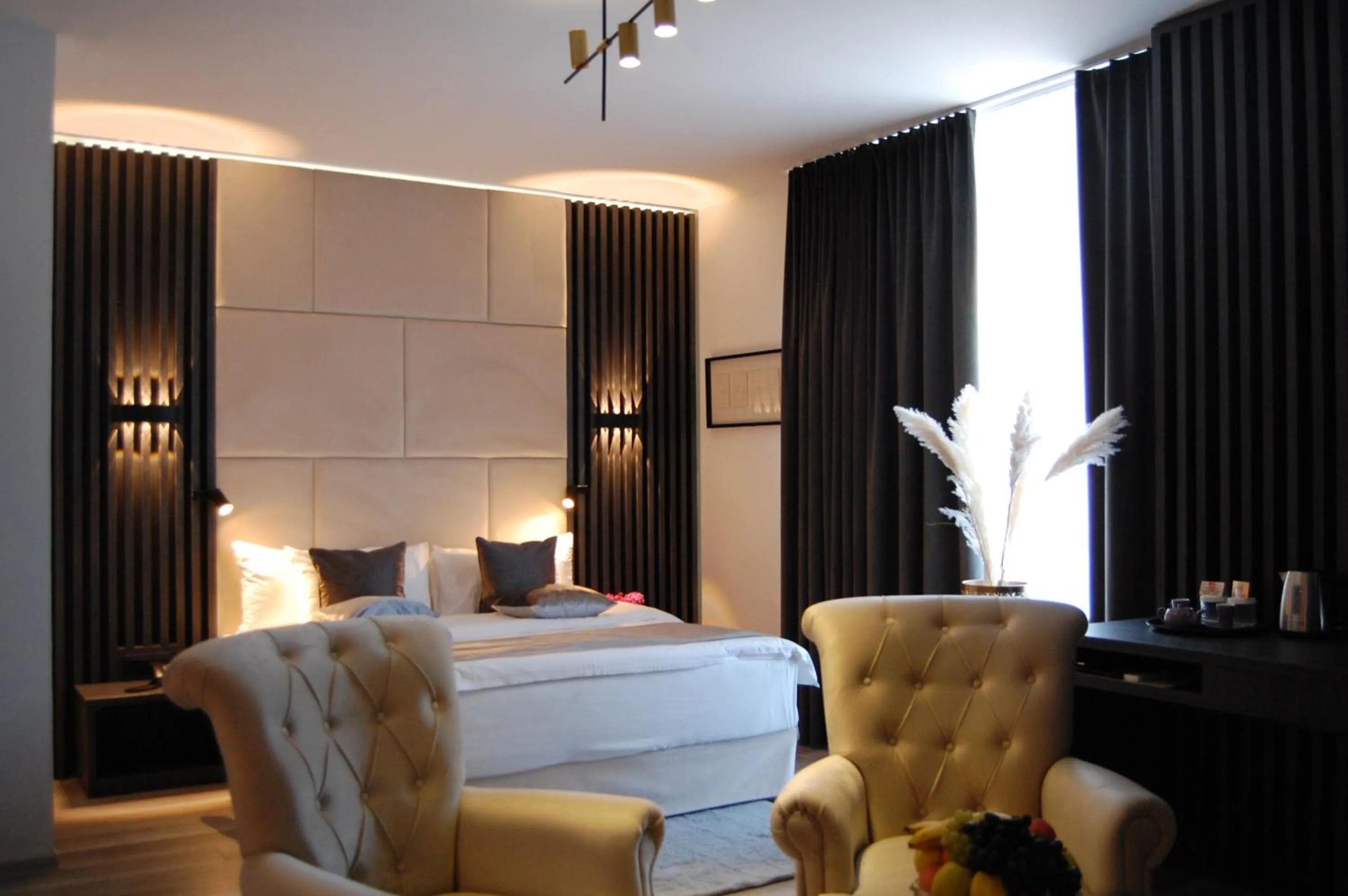 Seating area, Bed in Unique Boutique