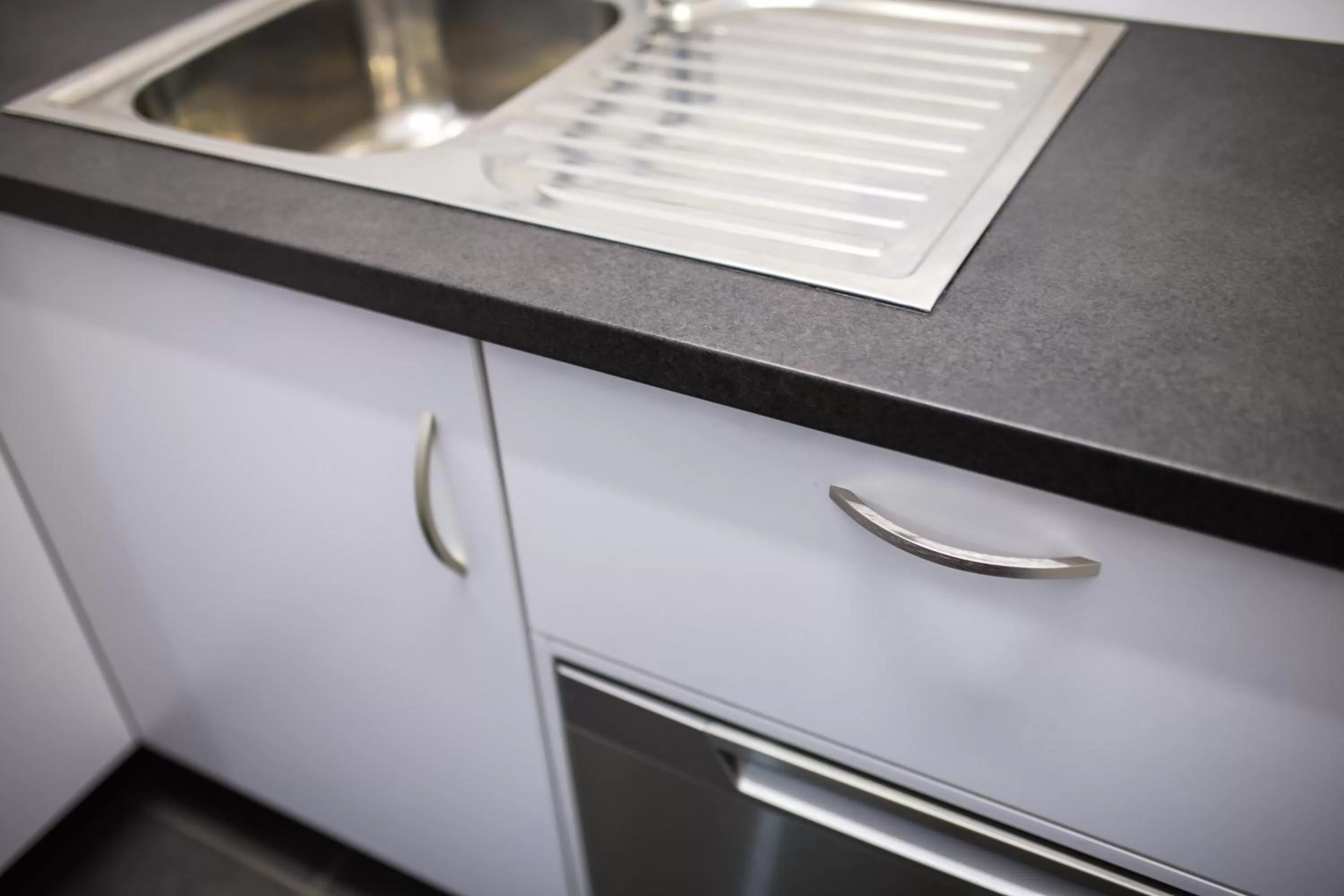 Kitchen or kitchenette in Glenmore Palms Motel