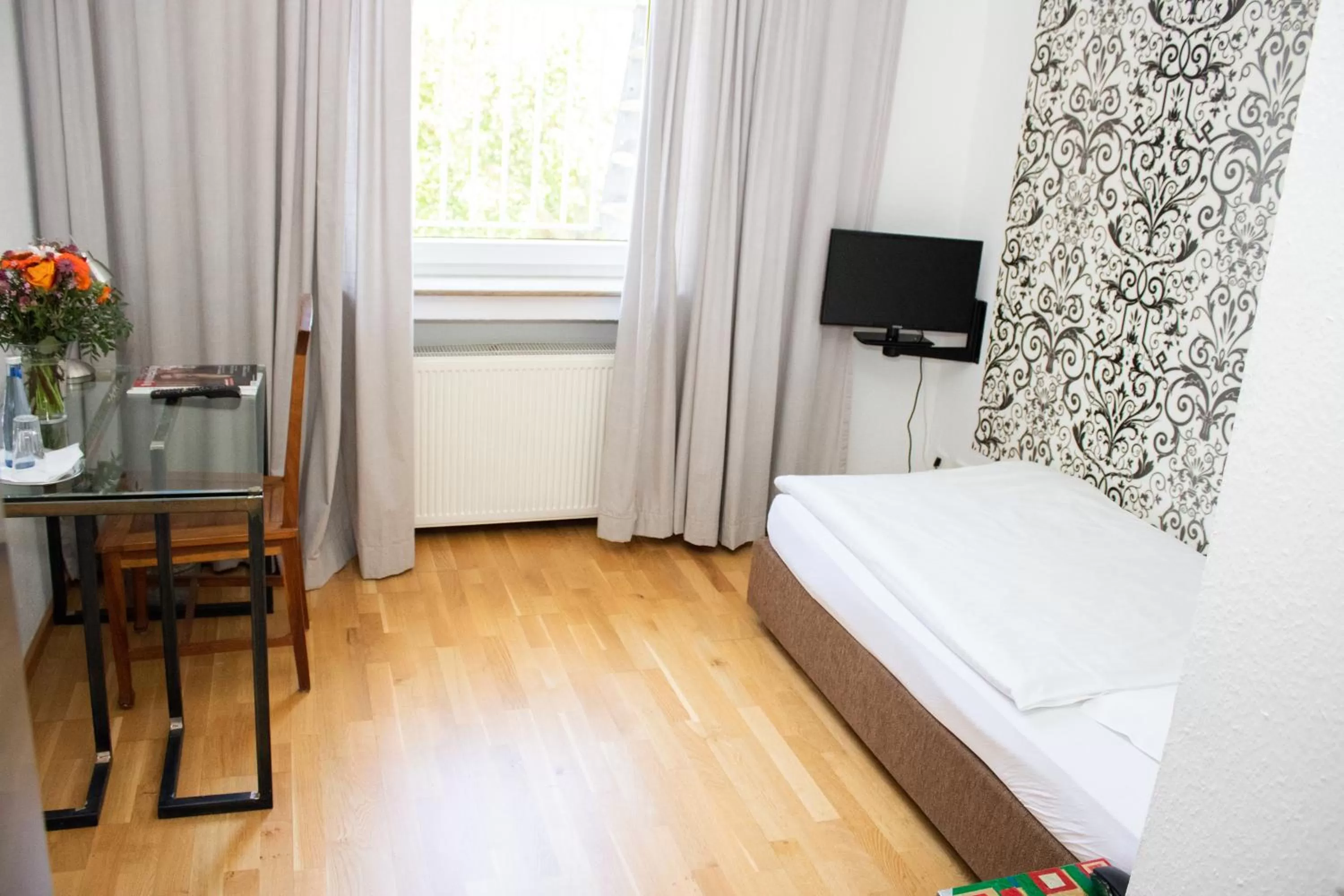 Photo of the whole room, Bed in Hotel Stern - Self Check-In