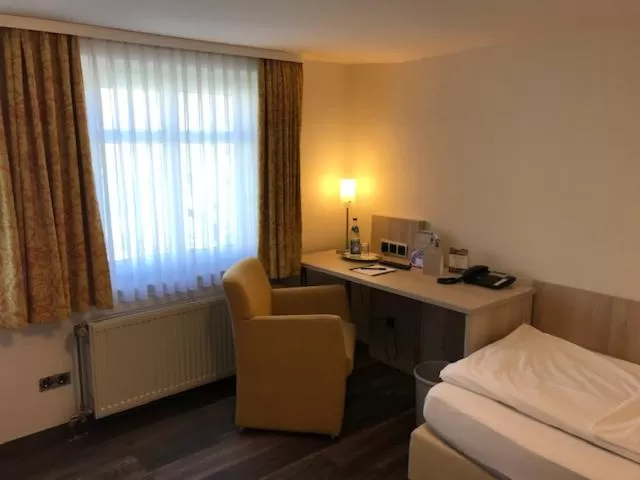 Seating area, Bed in Landgasthof Hotel Rittmayer