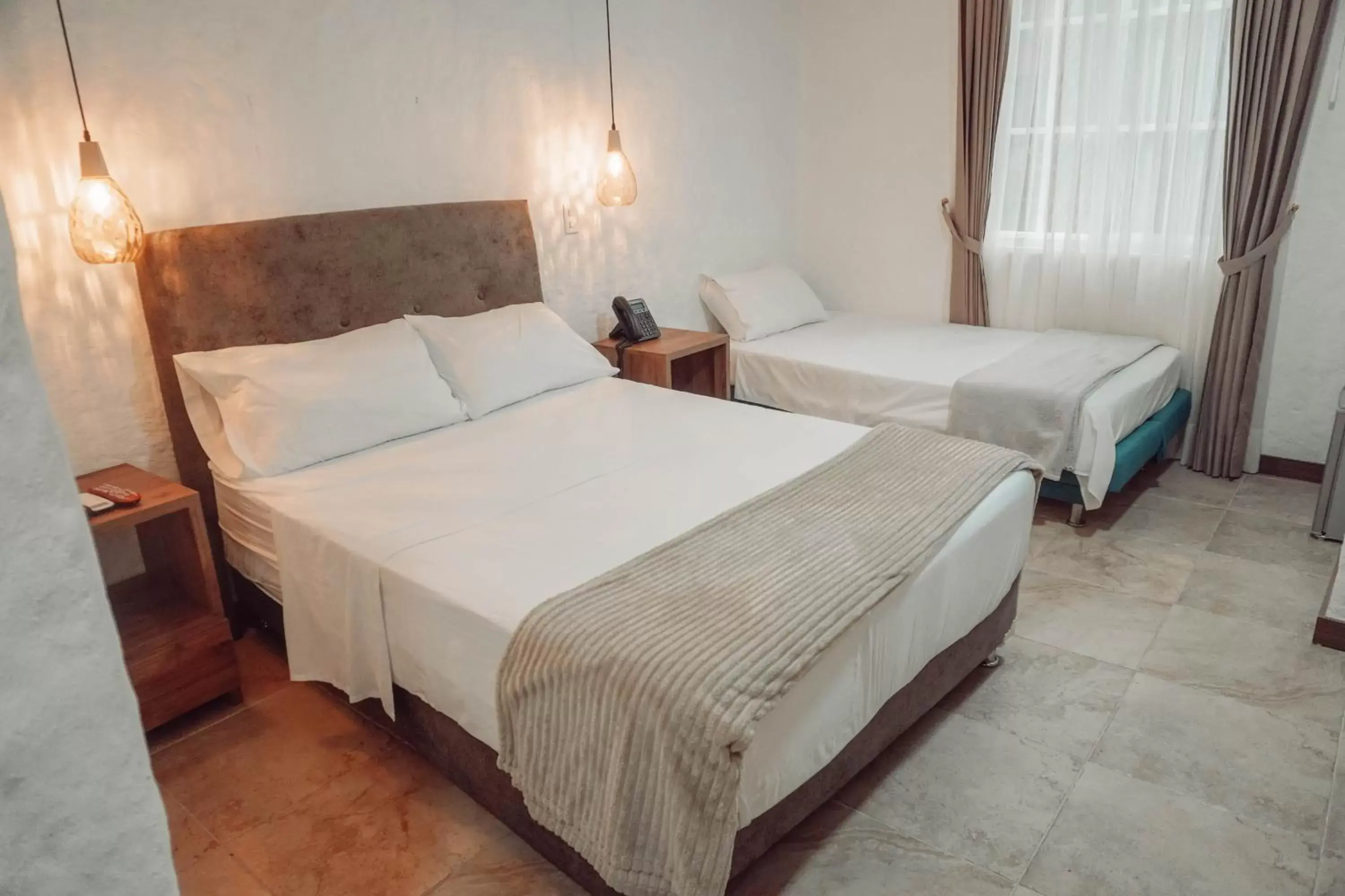 Superior Triple Room in Casa del Hidalgo Hotel Cali Centenario Superior Triple Room in Casa del Hidalgo Hotel Cali Centenario