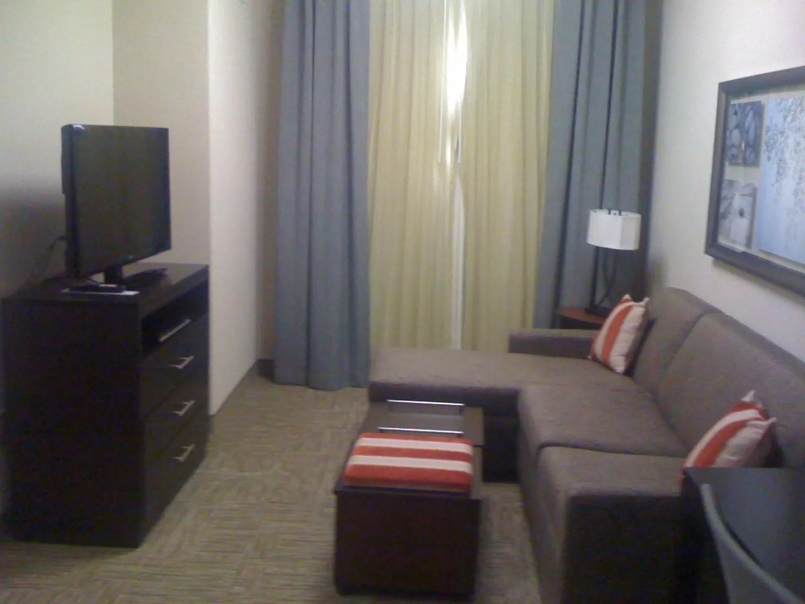 Communal lounge/ TV room in Staybridge Suites Houston Stafford - Sugar Land by IHG