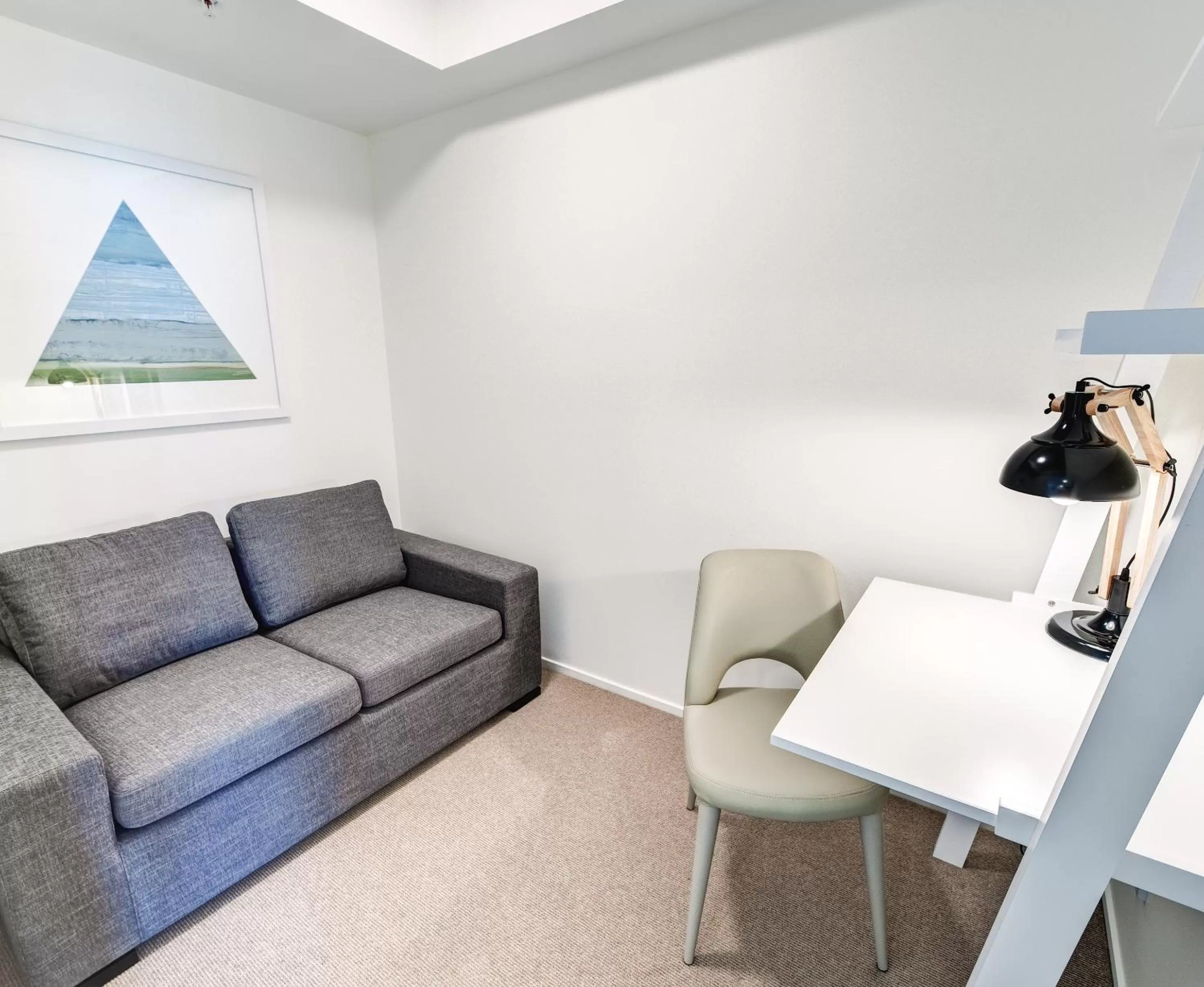 Bed in Belise Apartments