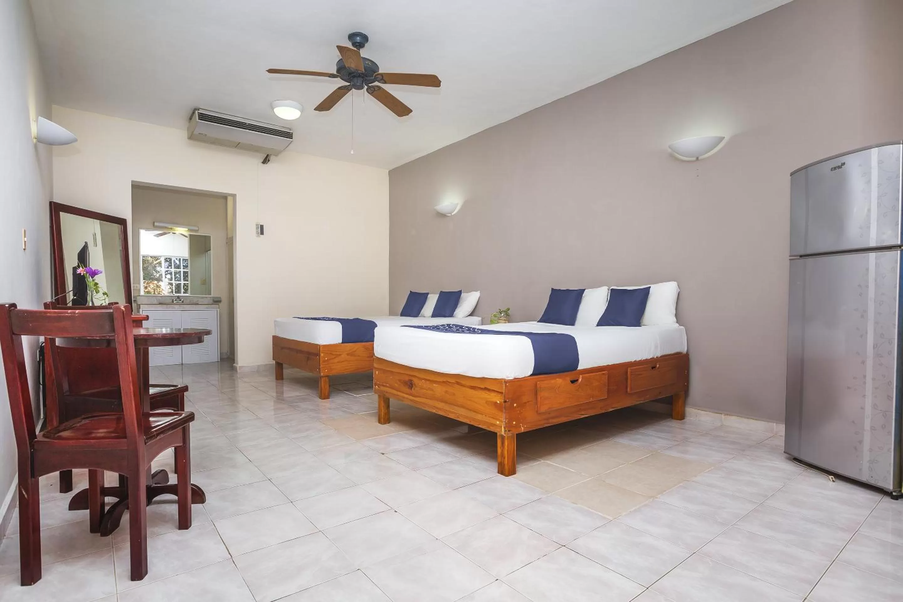 Bed in Hotel Kiin Cozumel