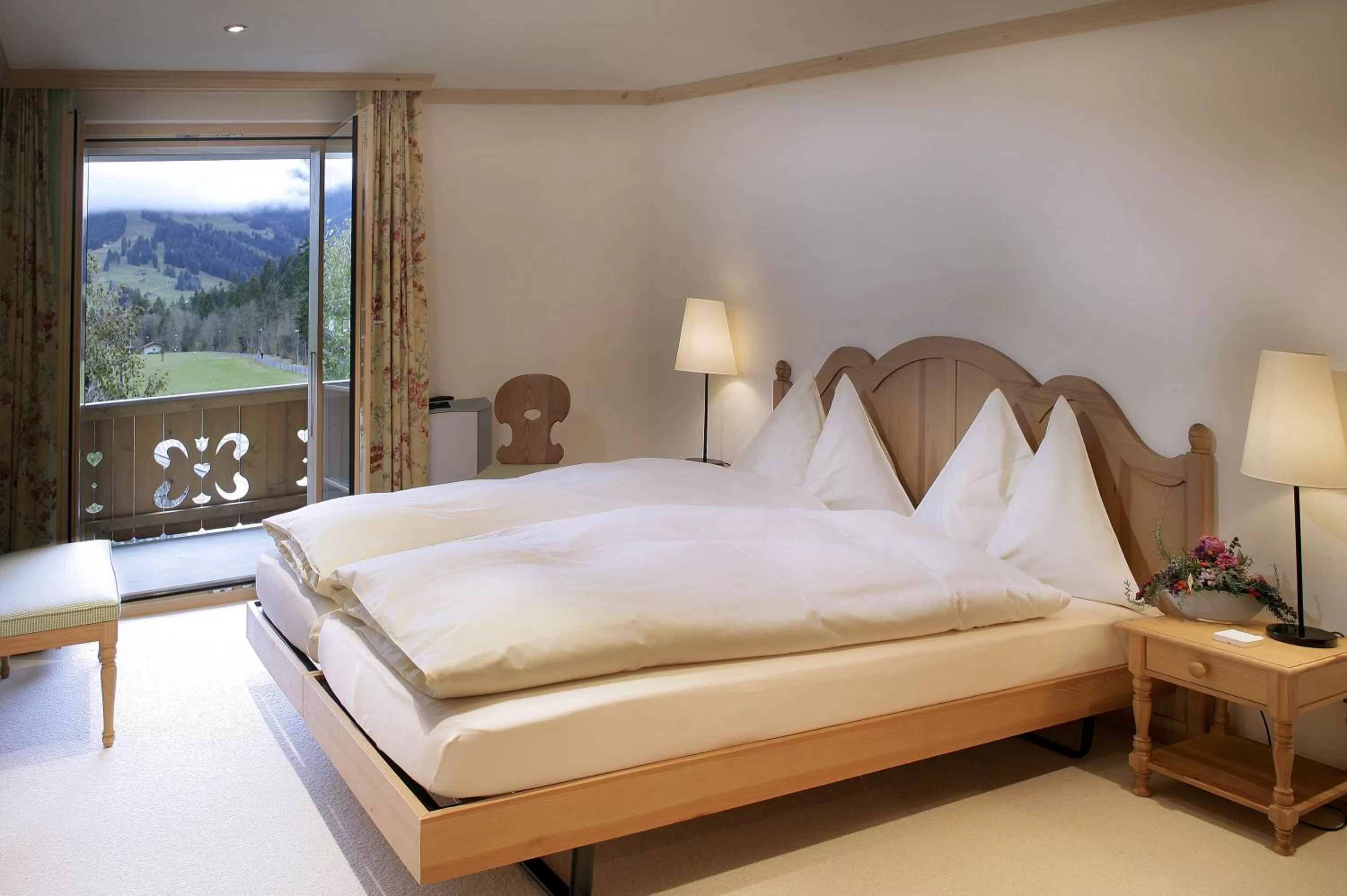 Photo of the whole room, Bed in Hotel Bellerive Gstaad