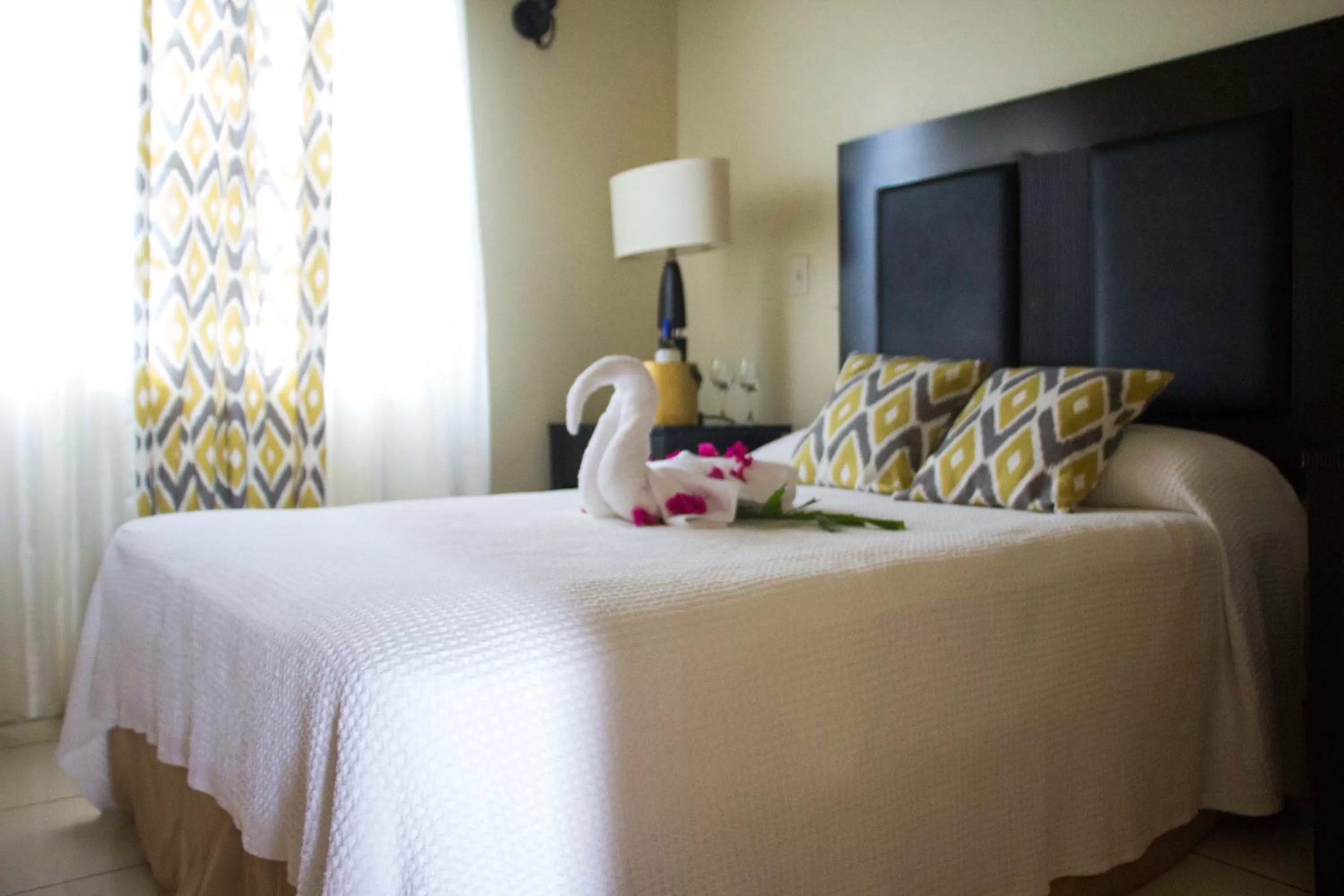 Bed in Connie's Comfort Suites