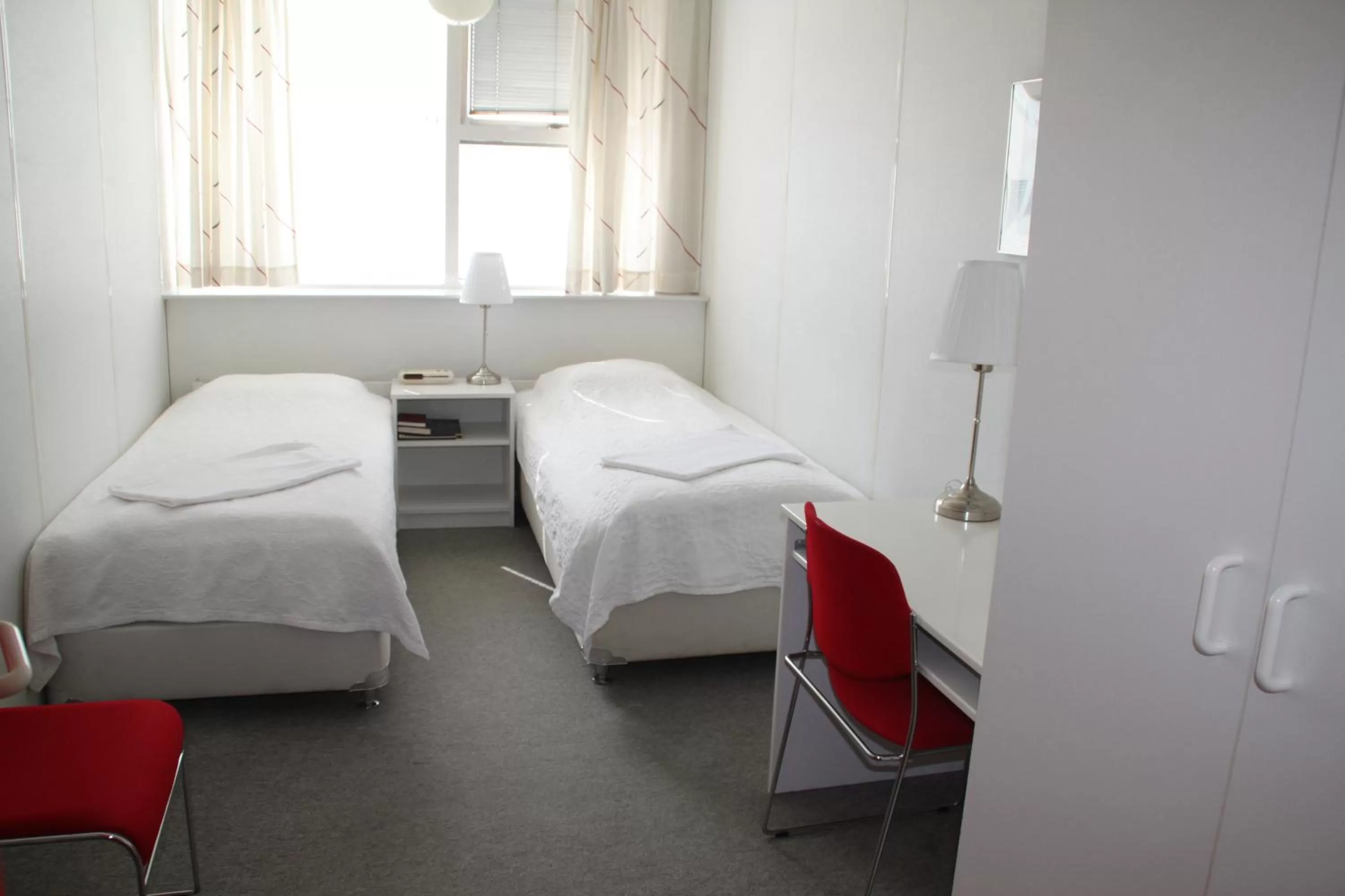 Bed in 101 Guesthouse Hotel