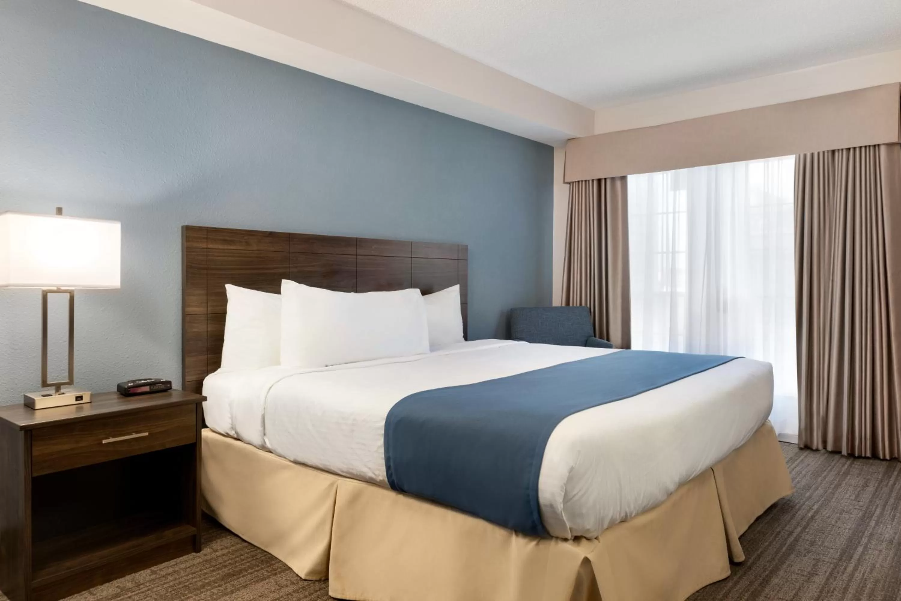 Bedroom, Bed in Travelodge Suites by Wyndham New Glasgow