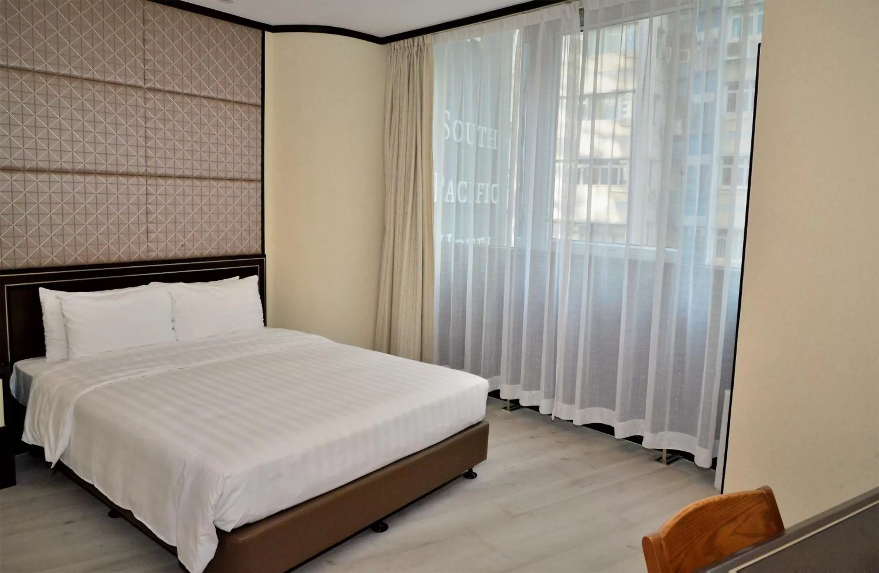 Bed in South Pacific Hotel