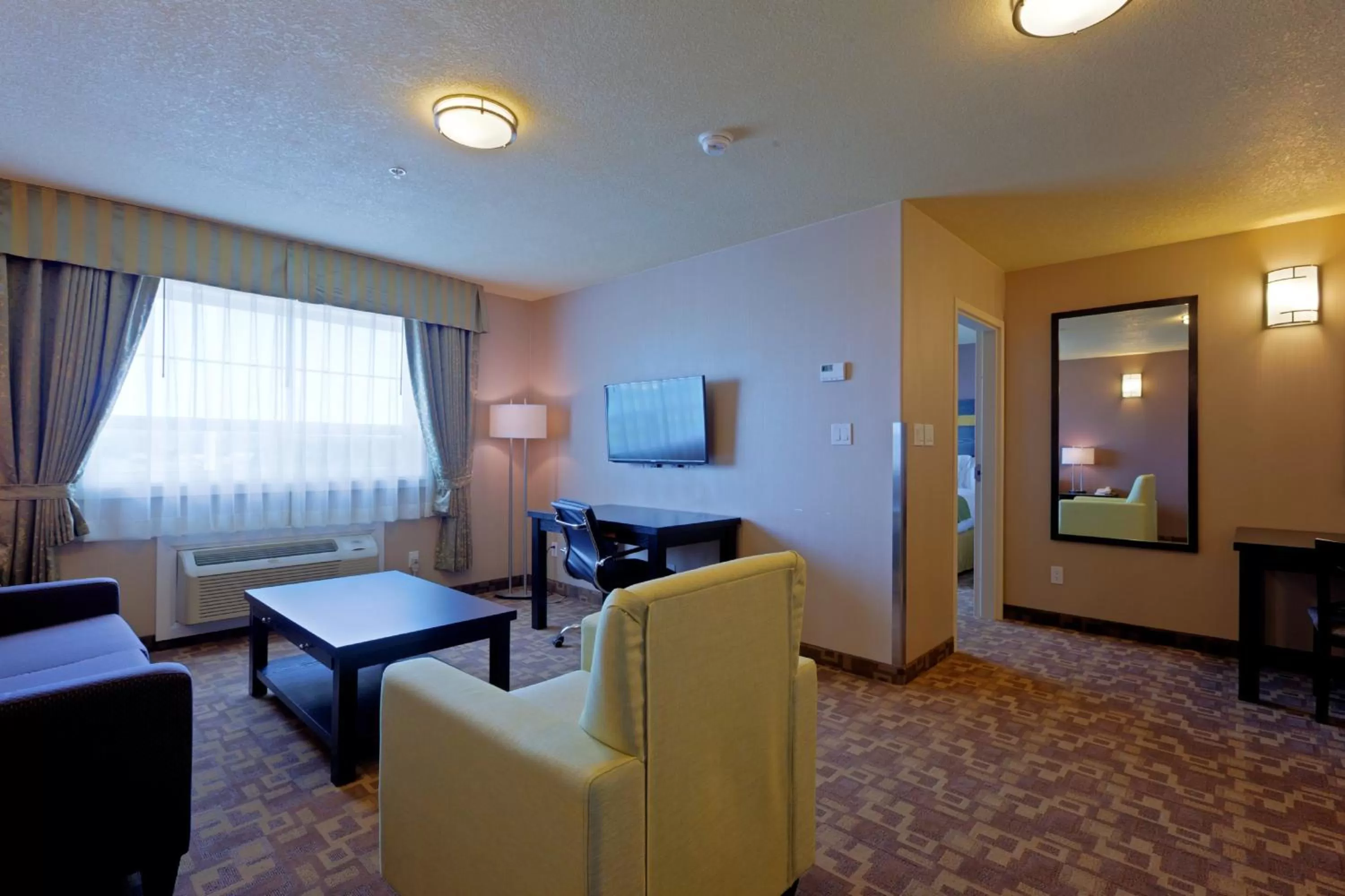 Photo of the whole room, Bed in Holiday Inn Express and Suites Dawson Creek, an IHG Hotel